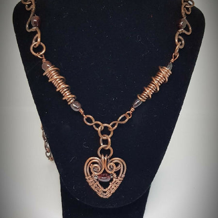 Jewellery Copper and Garnett long necklace with heart pendant