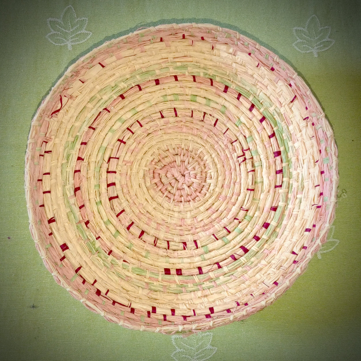 Woven tray basket with soft green and pink