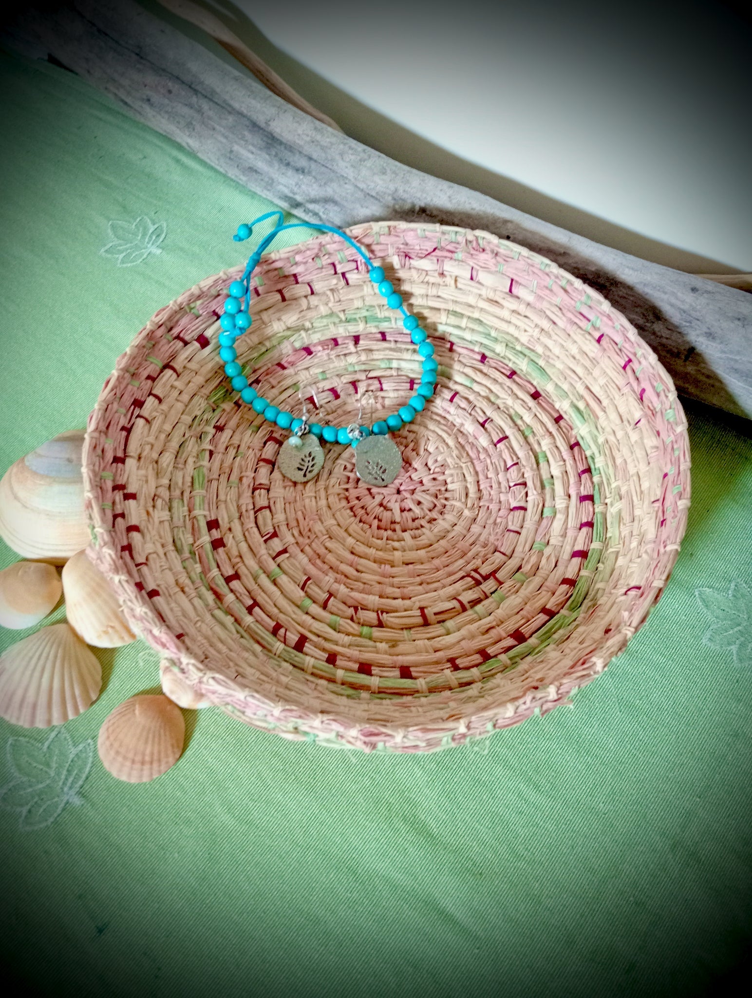 Woven tray basket with soft green and pink
