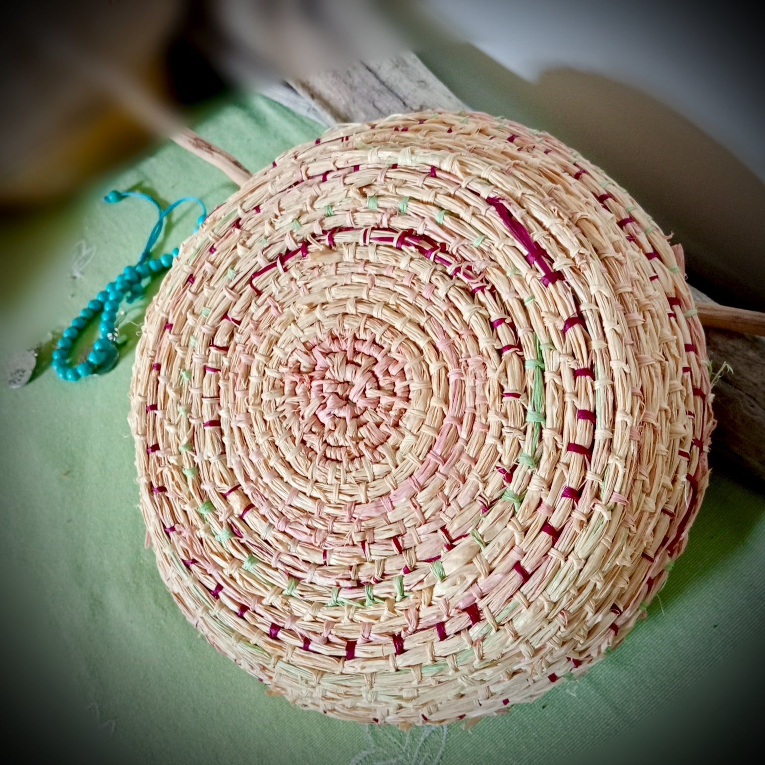 Woven tray basket with soft green and pink