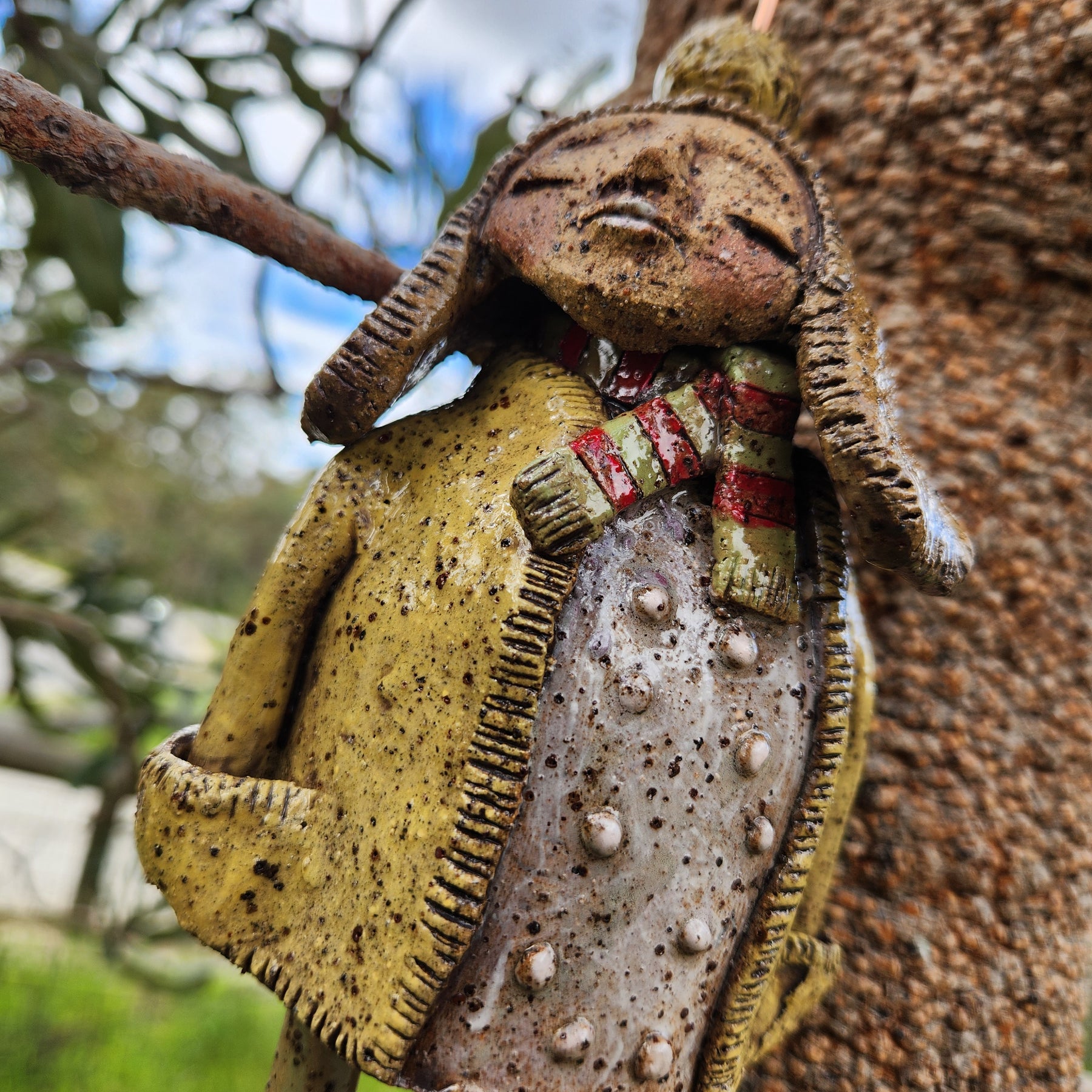 Handmade clay windchime, little girl
