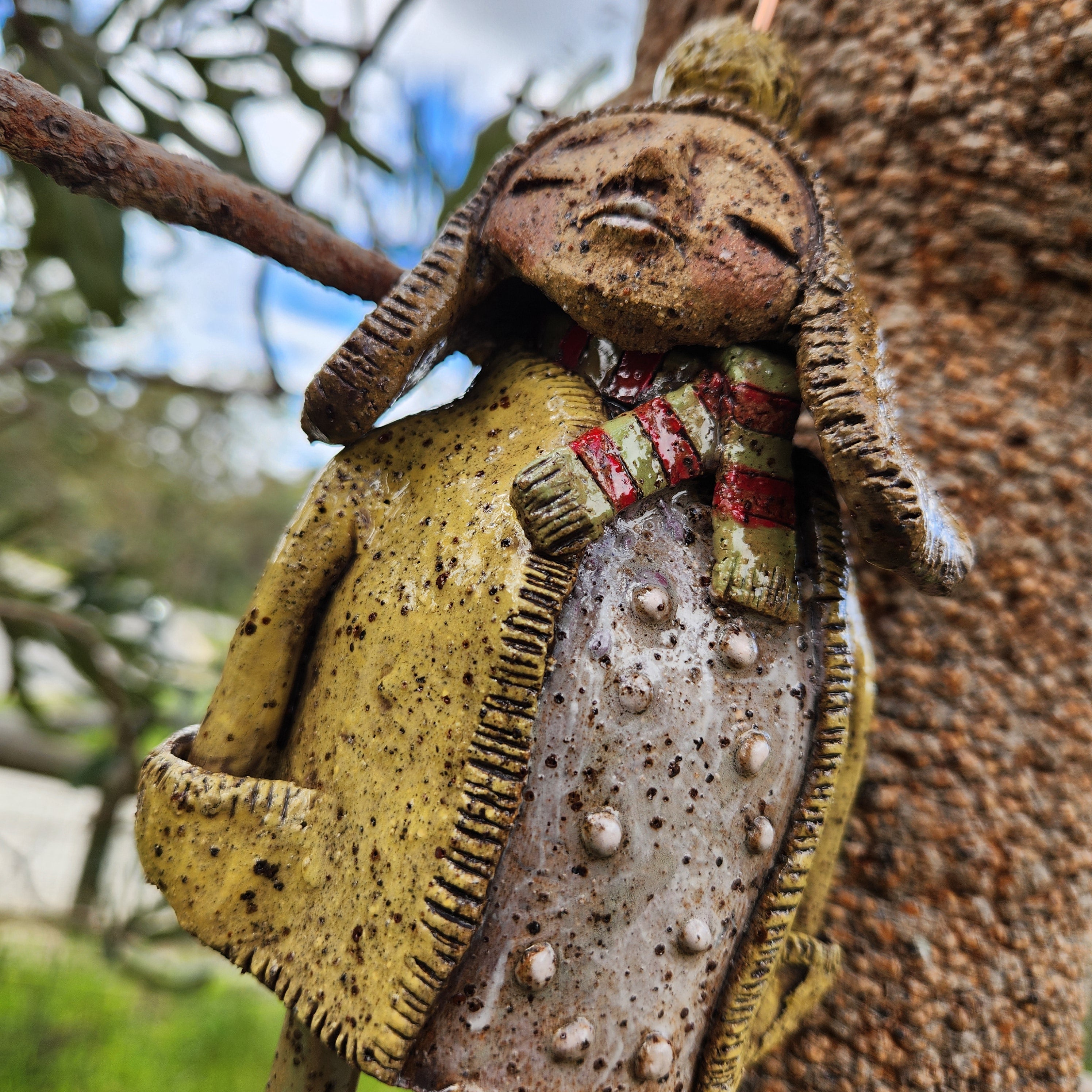 Handmade clay windchime, little girl