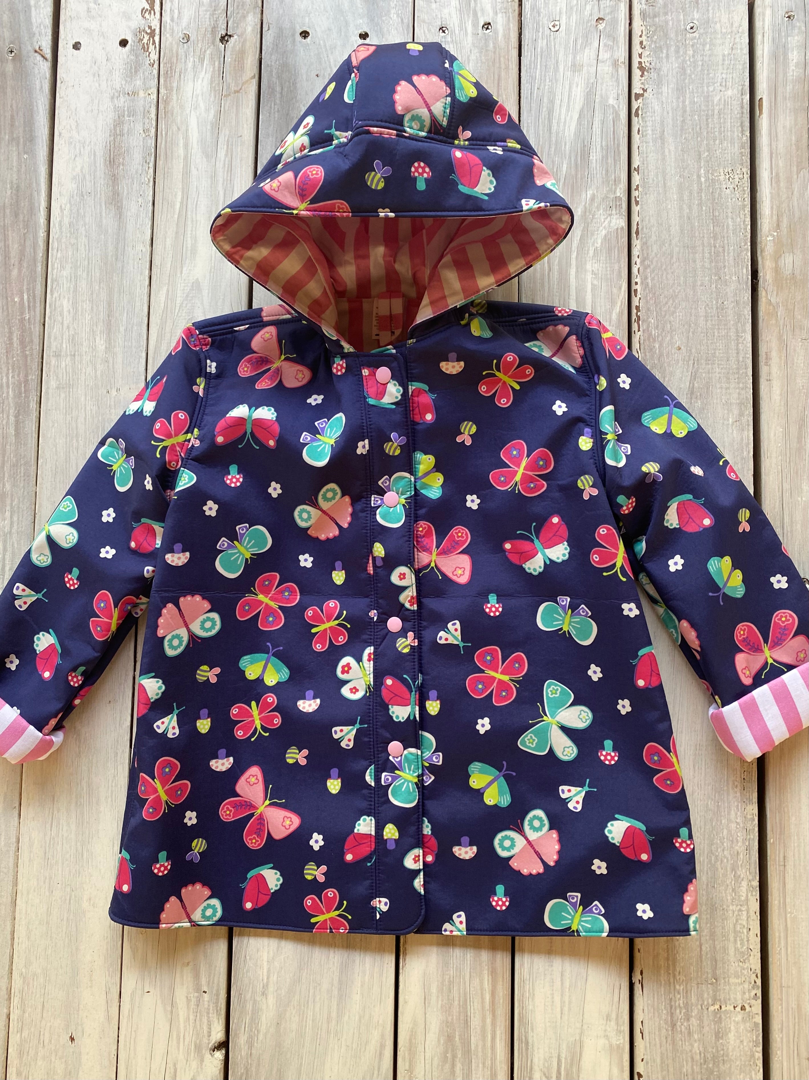 Showerproof Butterflies on Blue Hooded Jacket size 5