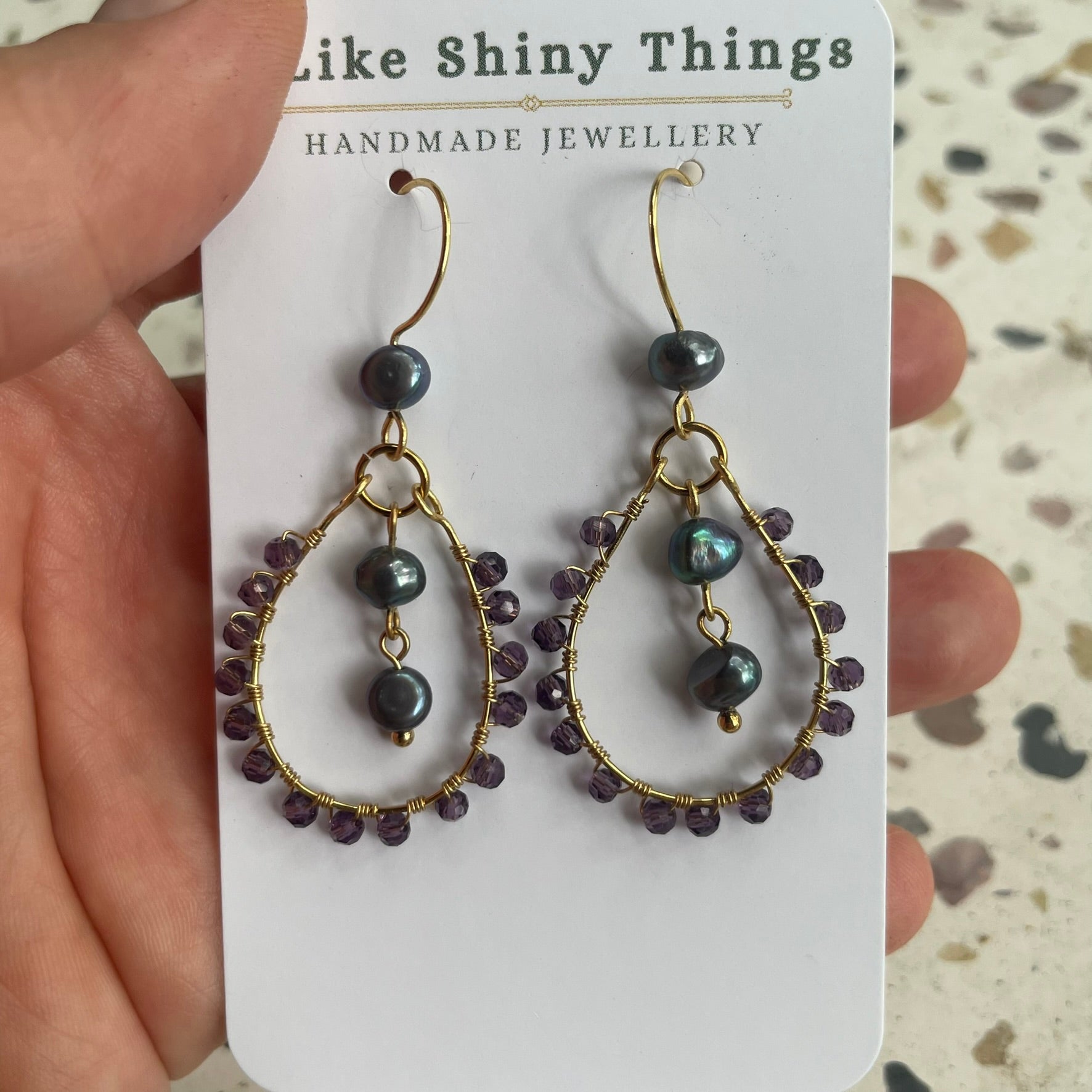 Wire-wrapped purple reclaimed pearl earrings brass