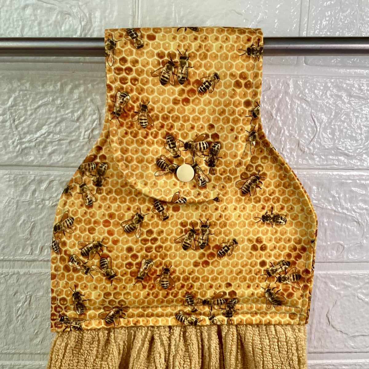 Bees (gold/tan) hanging hand towel.