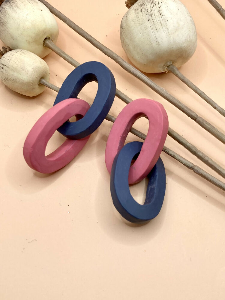 Links pink and blue dangle stud earrings