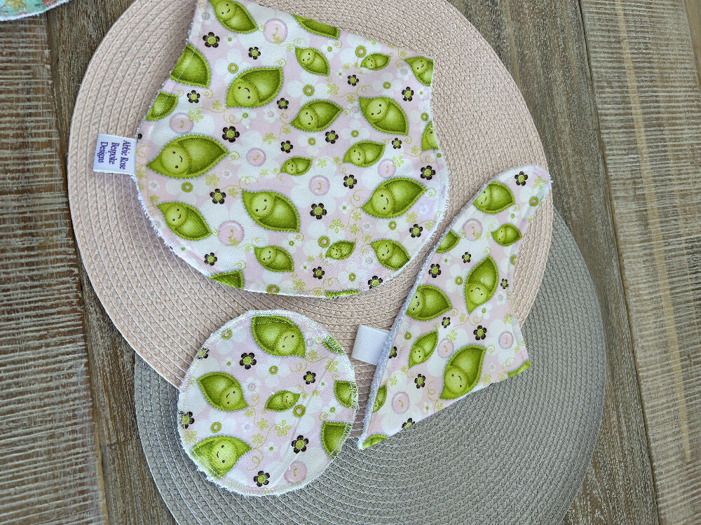 Bib, burp cloth and reusable breast pad set