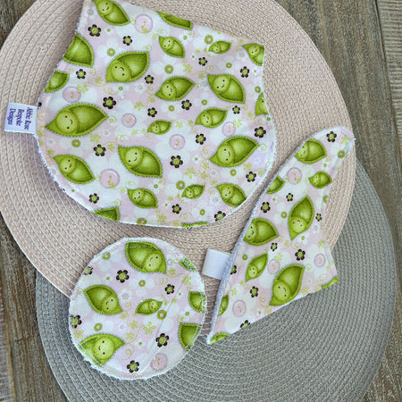 Bib, burp cloth and reusable breast pad set