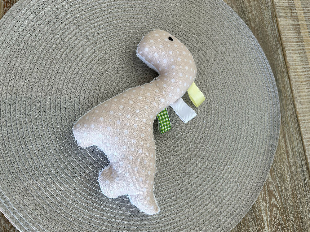 Dino squishy with tags