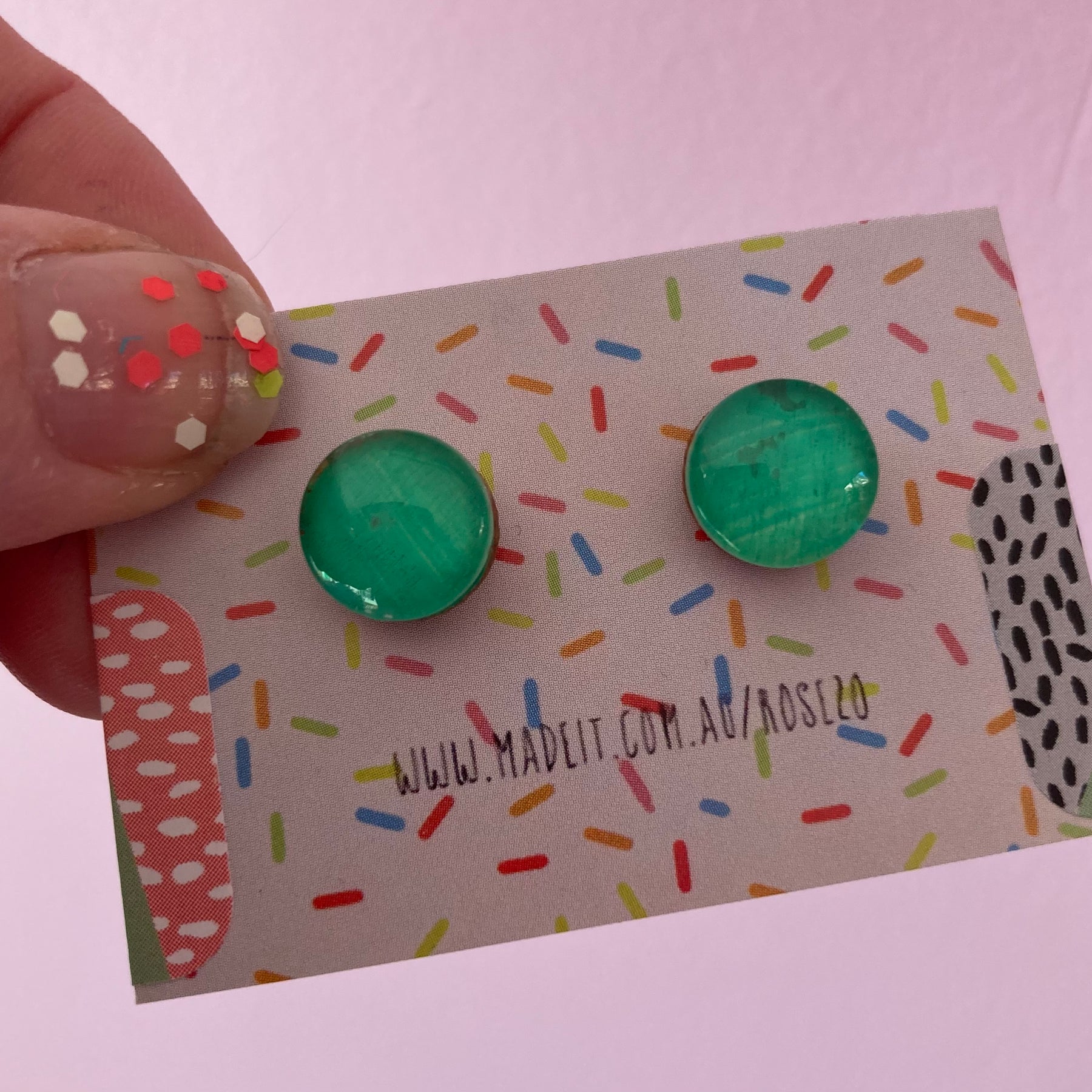 Green glass domed studs
