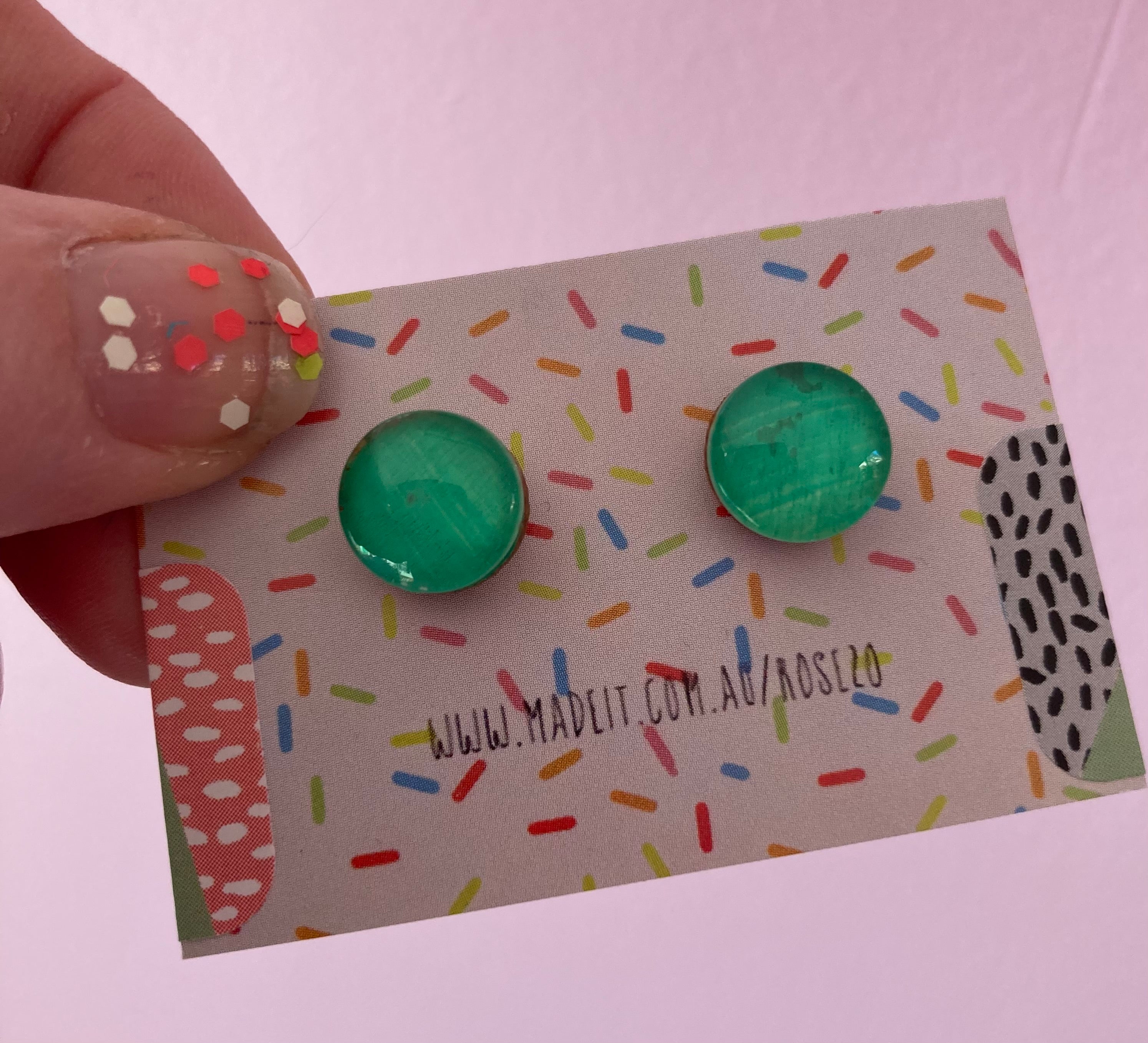 Green glass domed studs