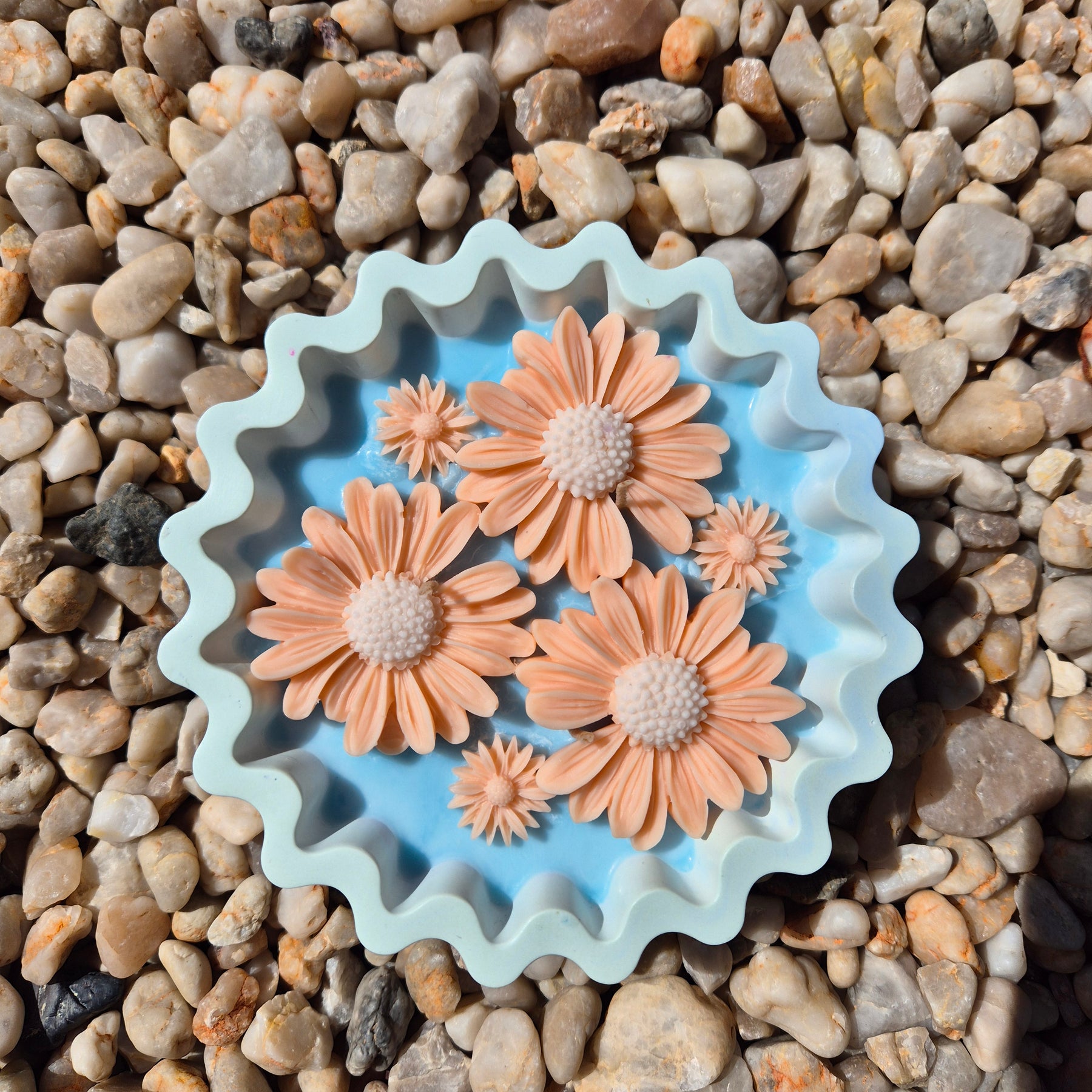 Round fluted blue and peach concrete daisy bowl candle