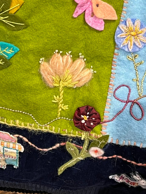 Handmade and hand embroidered cushion