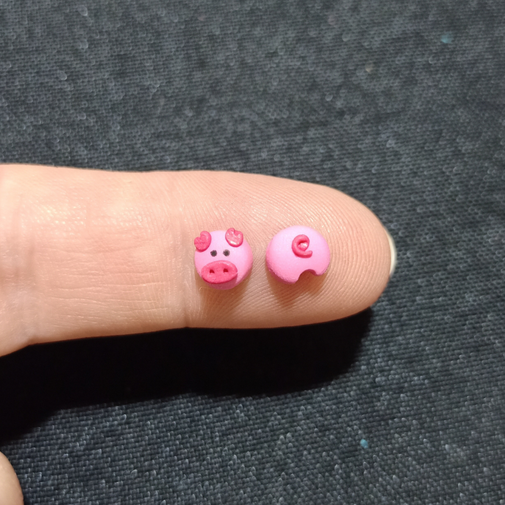 Pig stud earrings