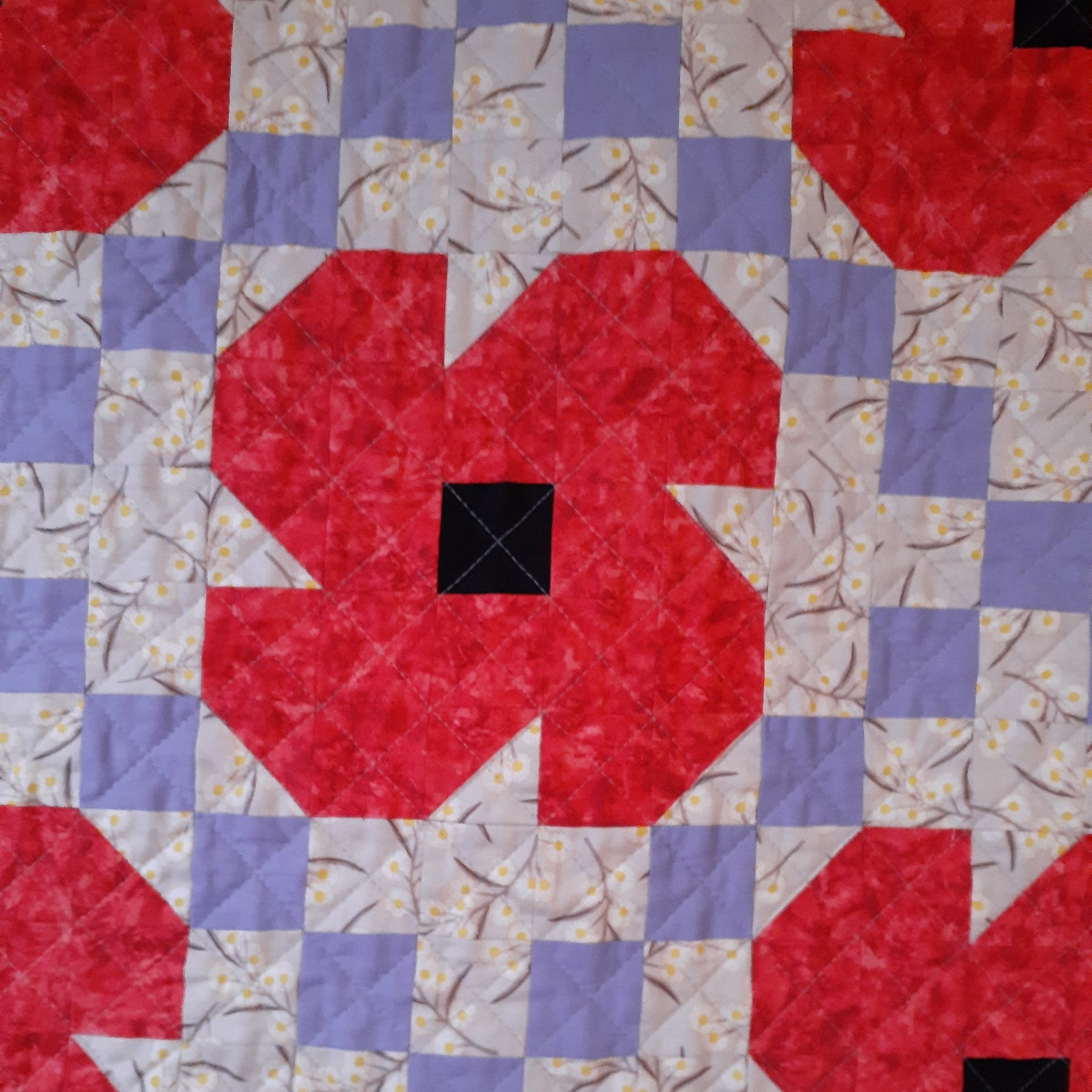 Red poppies Irish chain patchwork quilt