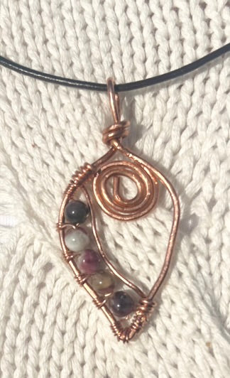 Unique Copper Spiral Gemstone Pendant with brown cord