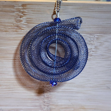 Pendant necklace. Celtic. Blue Nylon mesh.