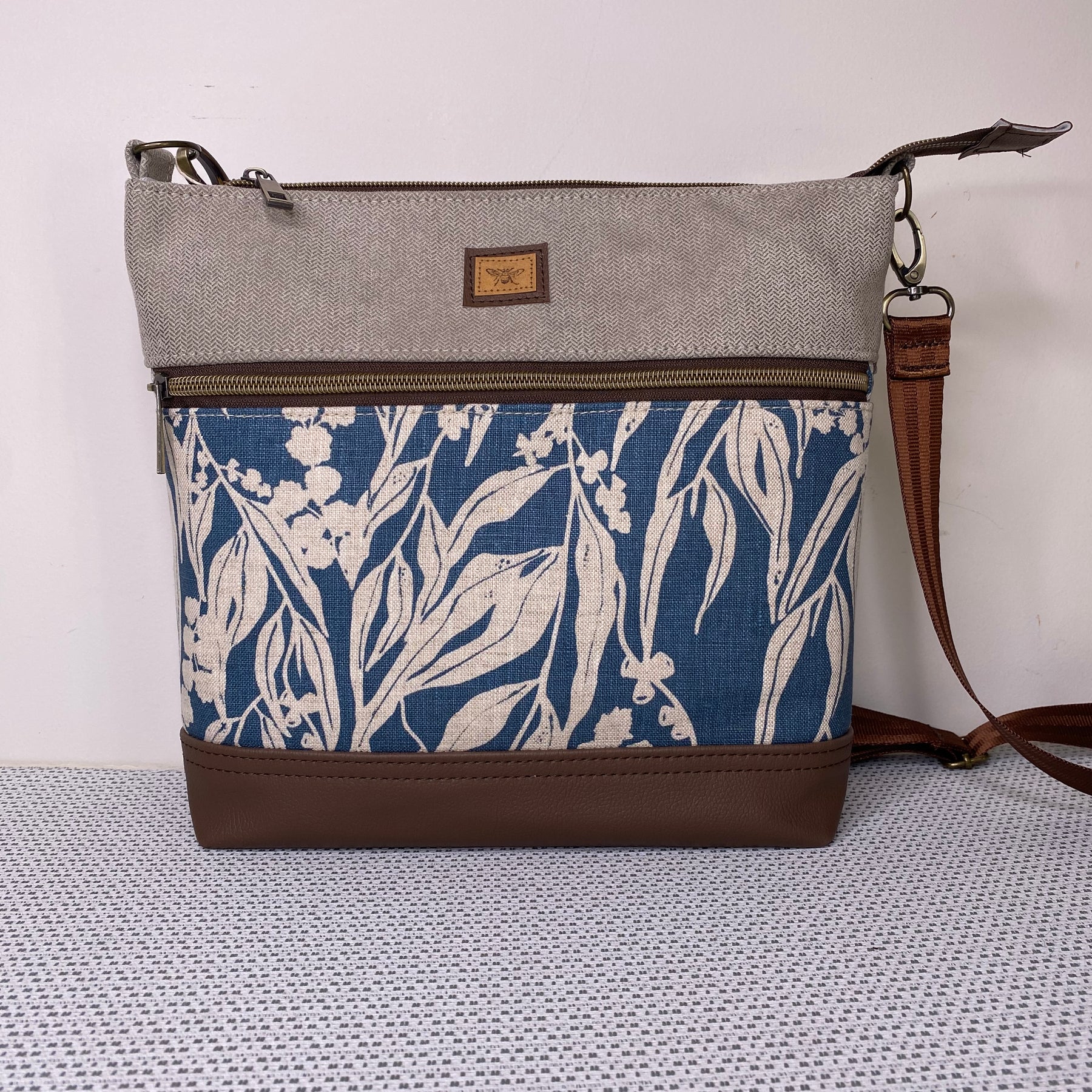 Lola Crossbody Bag - Hand Screen Printed Linen in Blue Gum leaves and Beige Fabric with Dark BrownFaux Leather Base