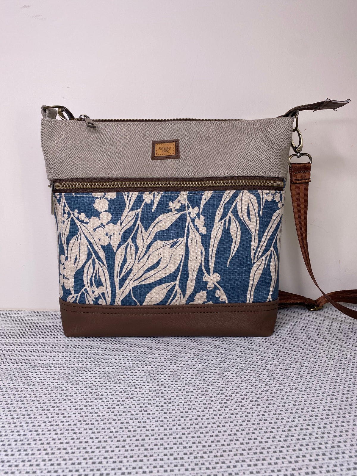 Lola Crossbody Bag - Hand Screen Printed Linen in Blue Gum leaves and Beige Fabric with Dark BrownFaux Leather Base