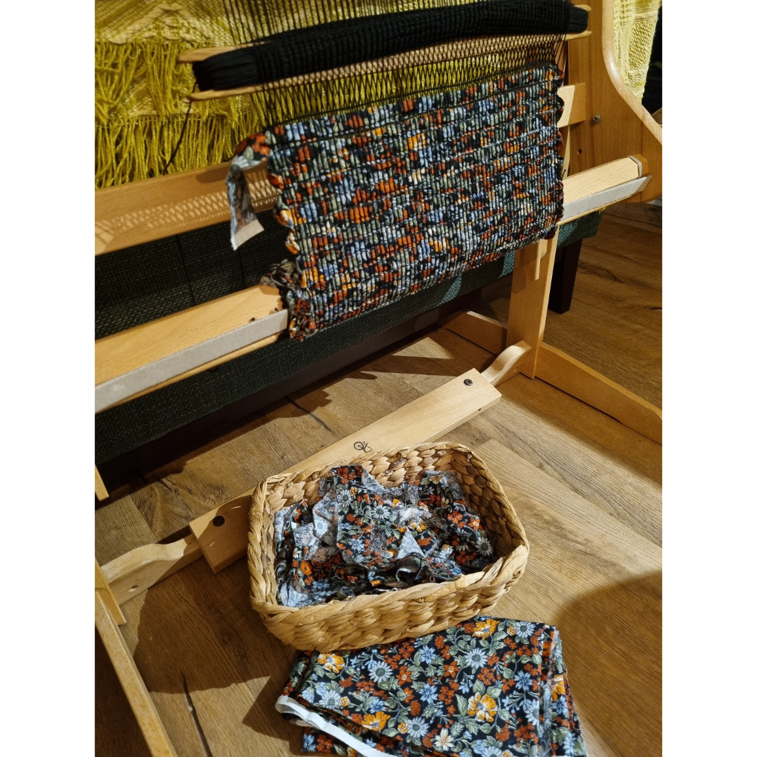 Woven black and orange floral tablerunner