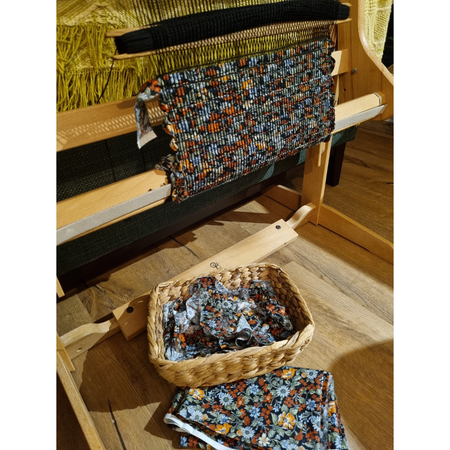 Woven black and orange floral tablerunner