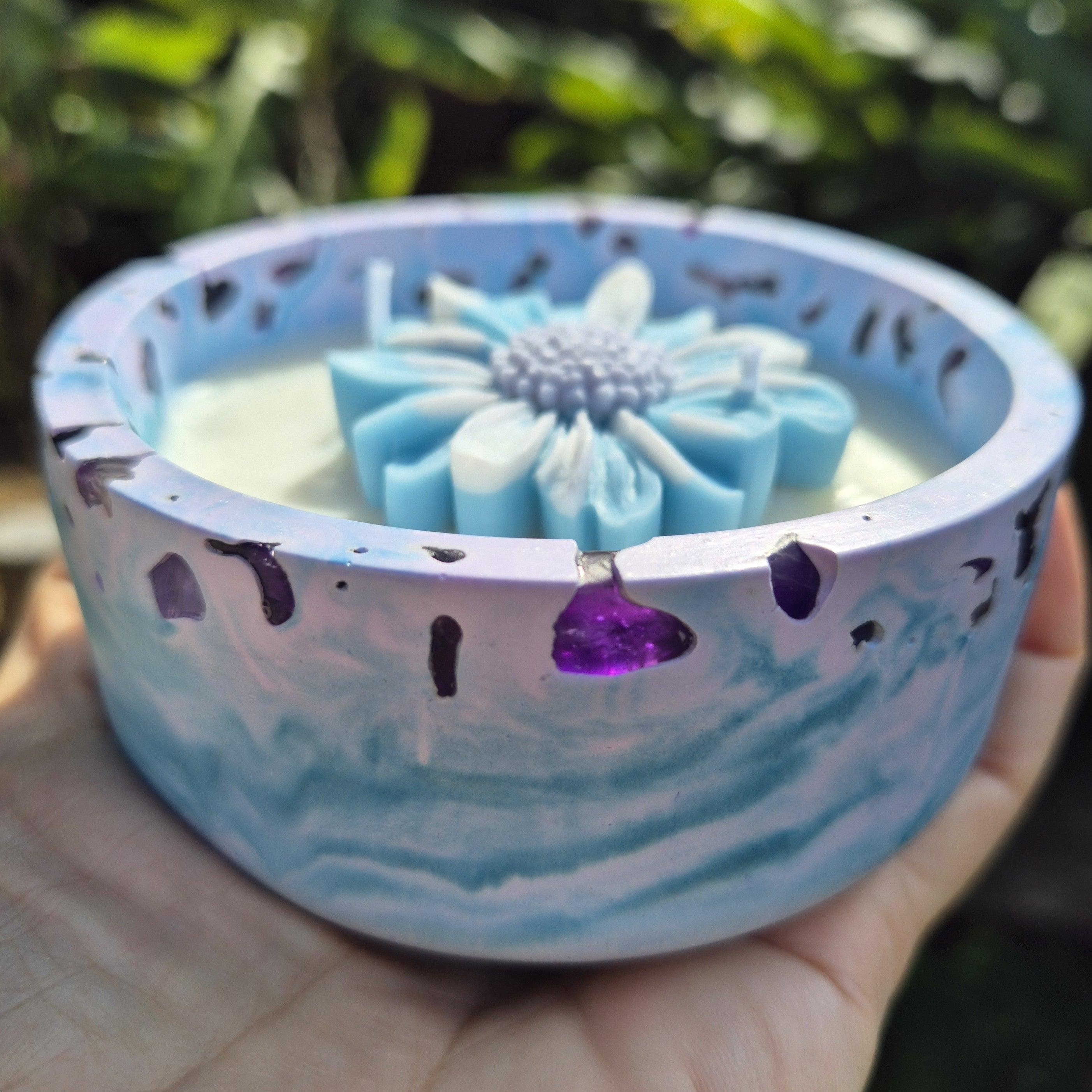 Round blue and purple concrete bowl candle with amethyst stones