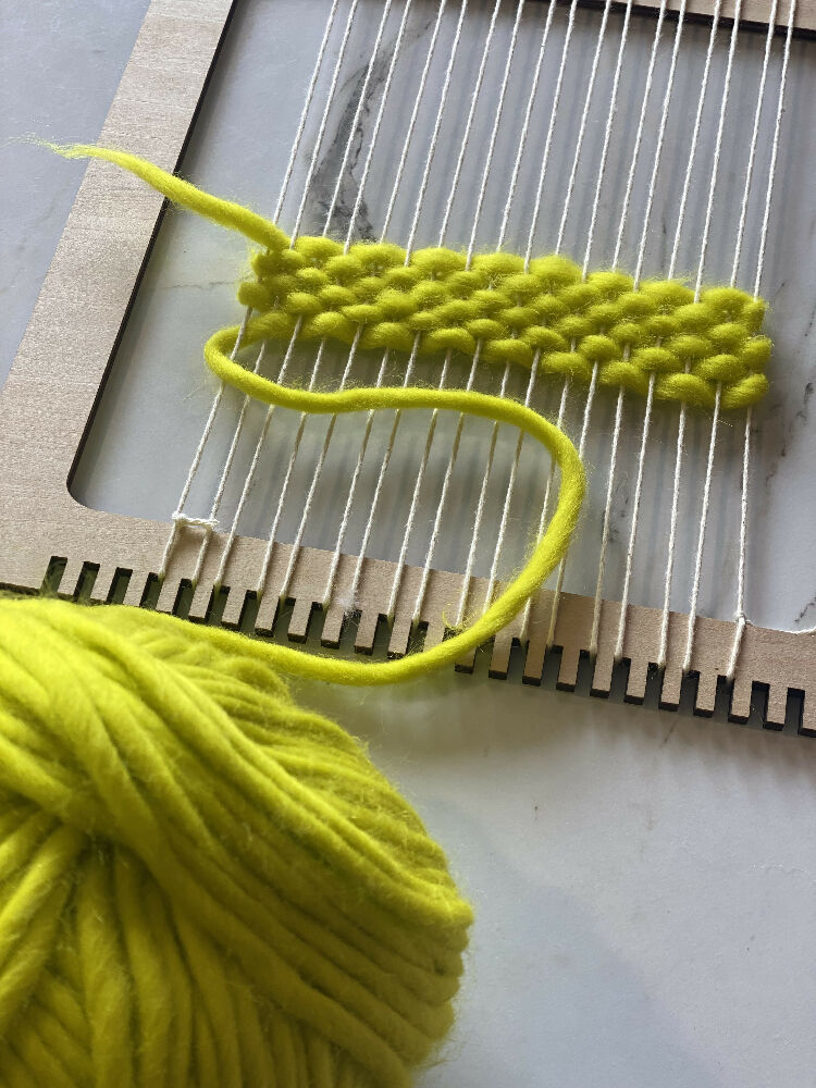 small loom with yarn