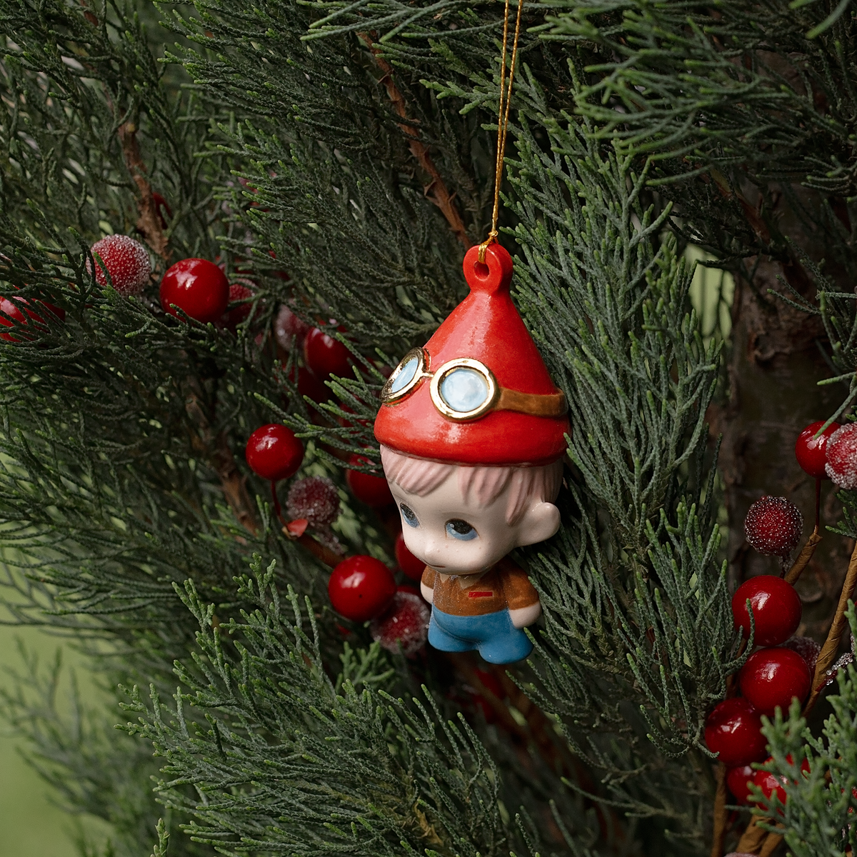 Handmade Porcelain Christmas ornament. One-of-a-kind. Malakai the Pilot Elf.