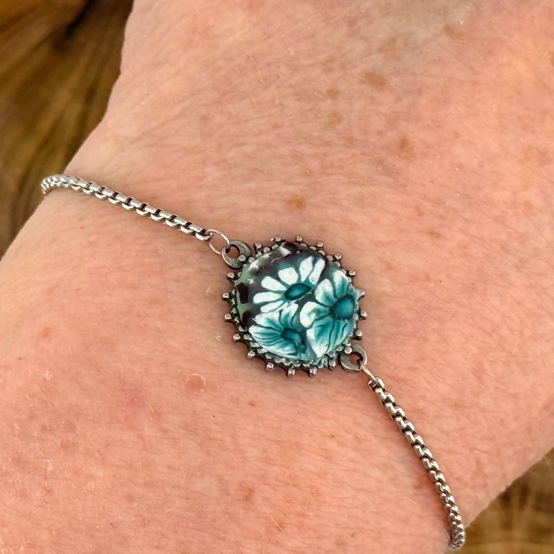 Green Daisies Stainless Steel Adjustable Slider Bracelet