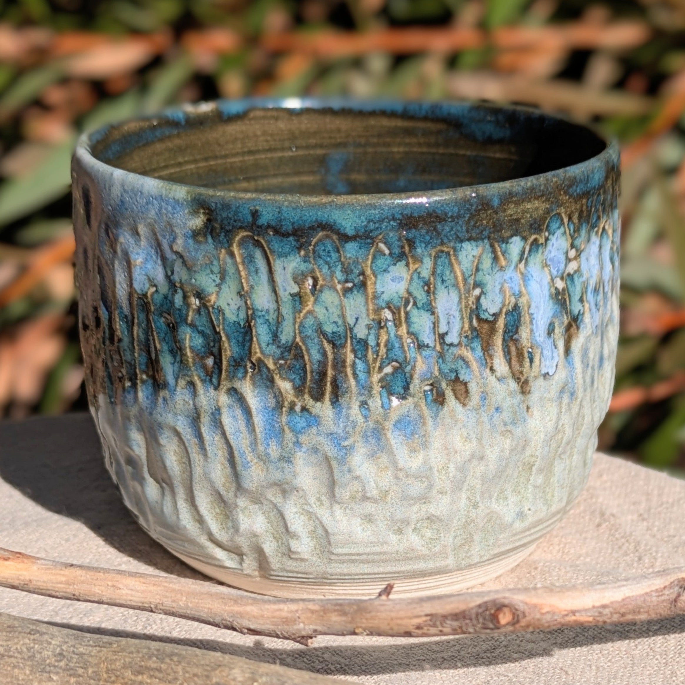 Small blue-green tea or espresso cup