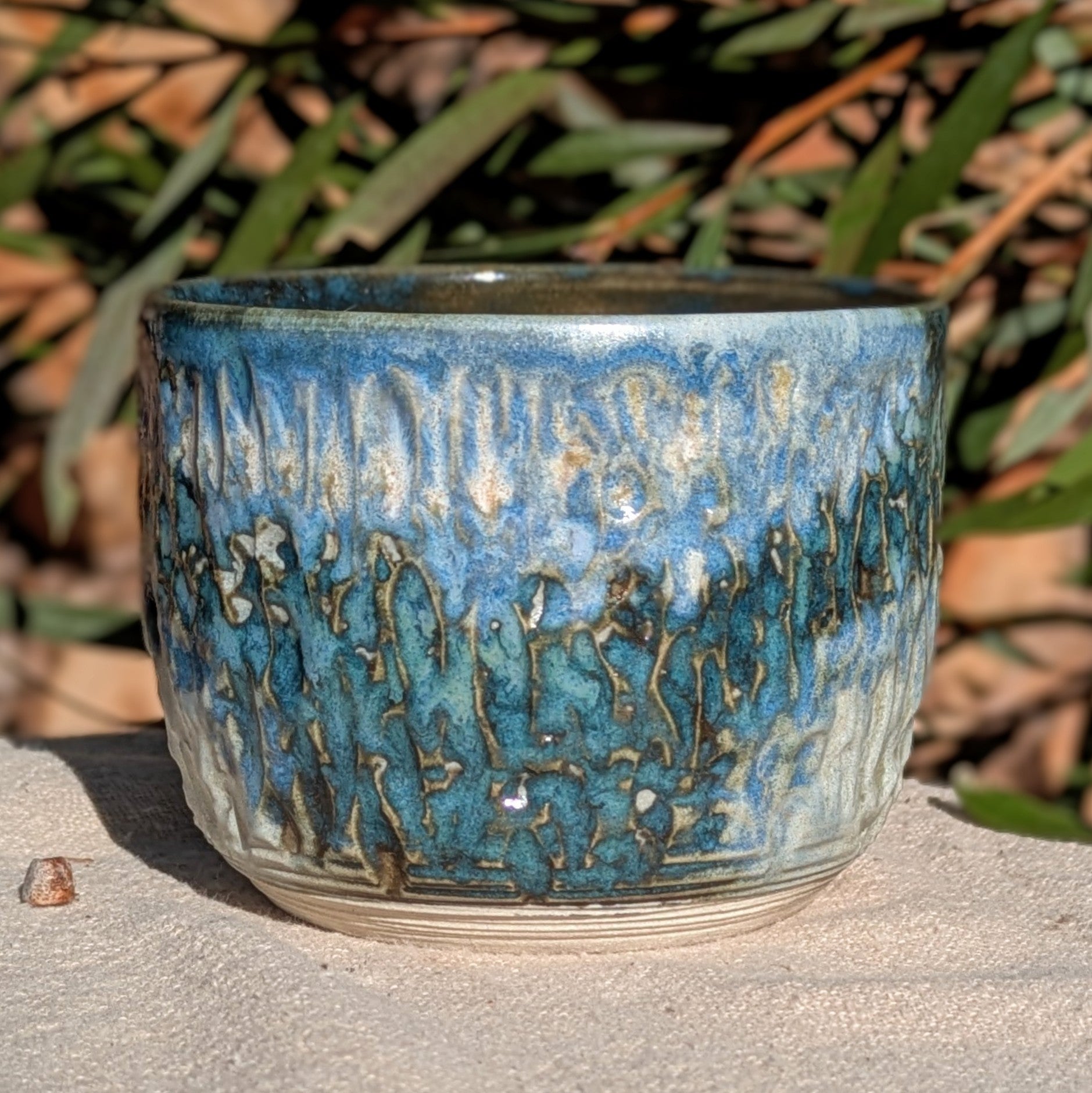 Small blue-green tea or espresso cup