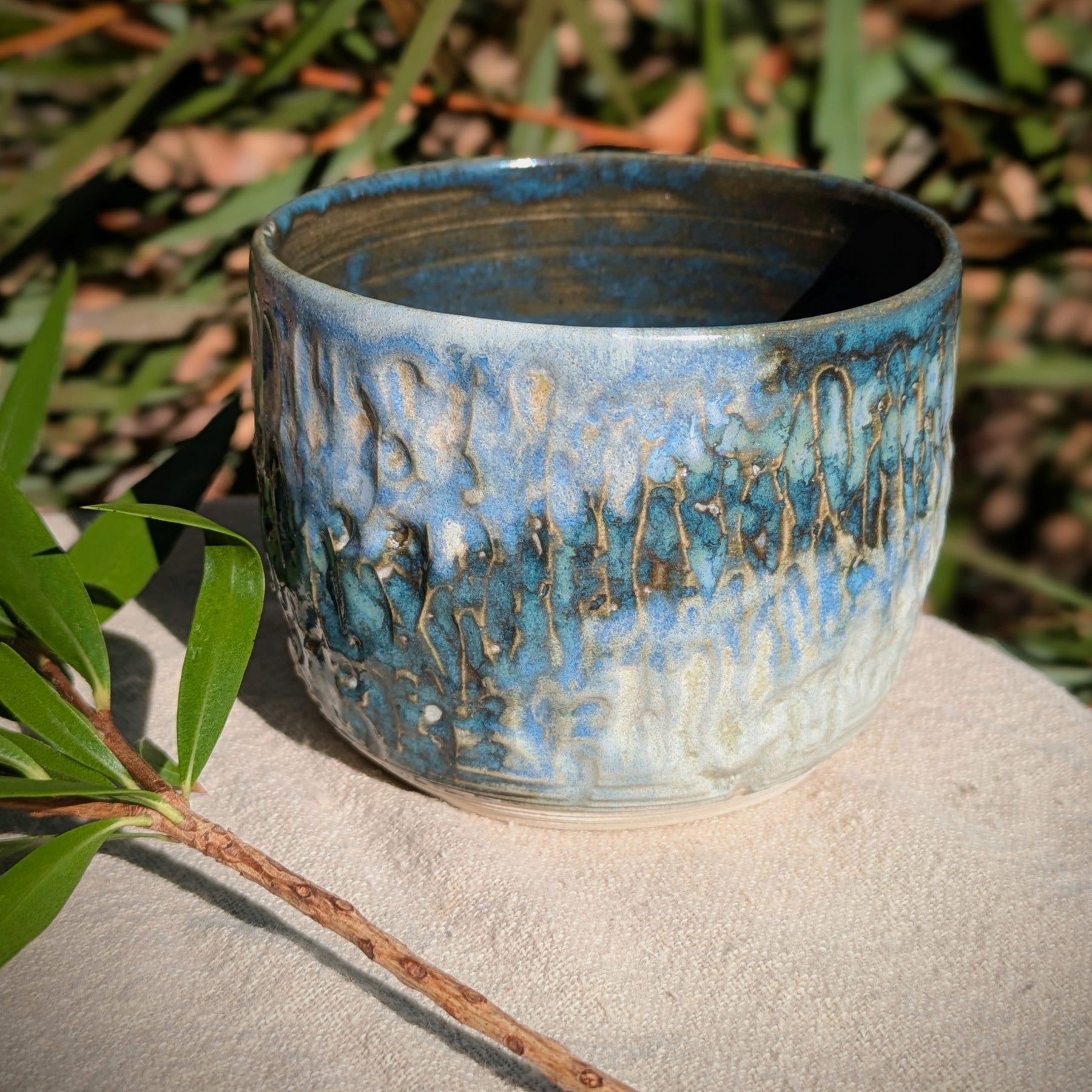 Small blue-green tea or espresso cup