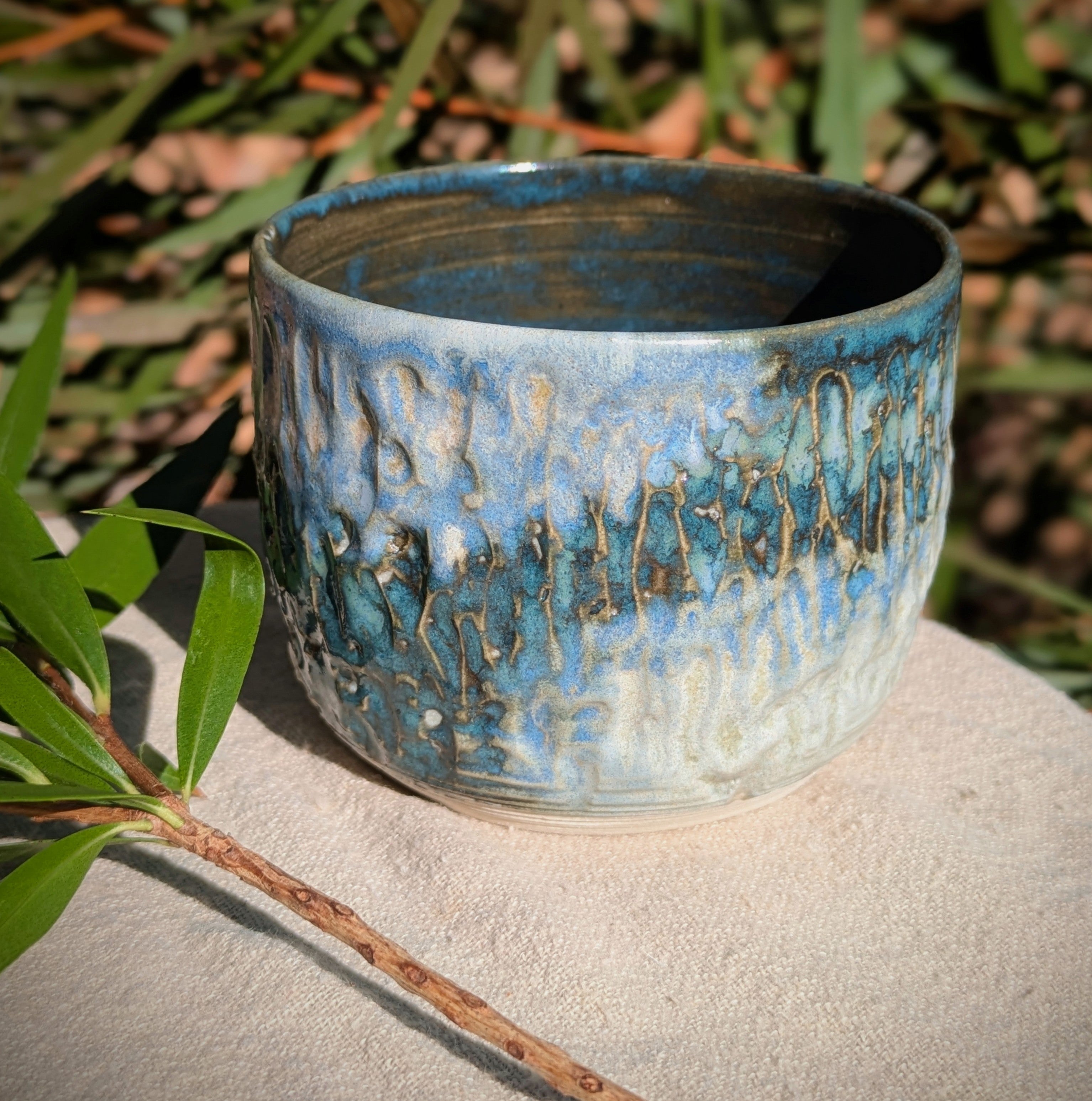 Small blue-green tea or espresso cup