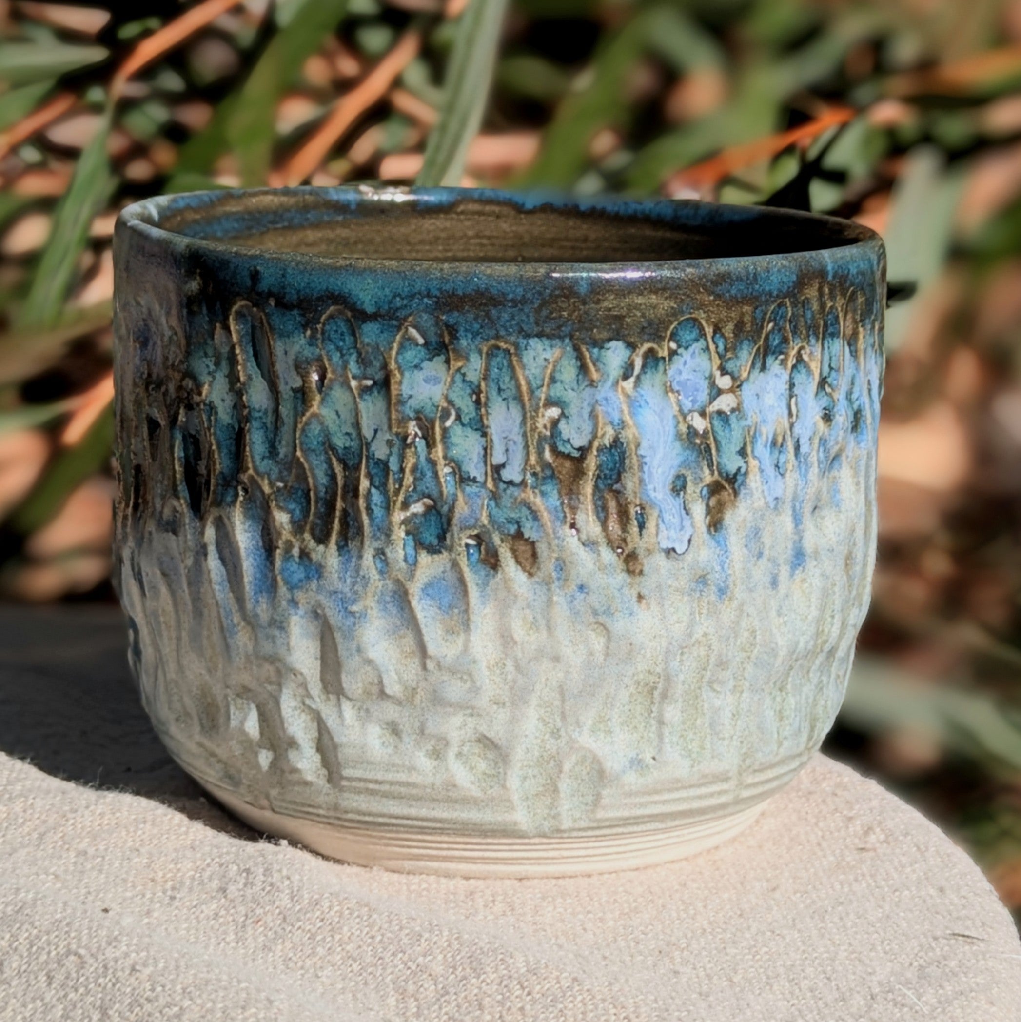Small blue-green tea or espresso cup