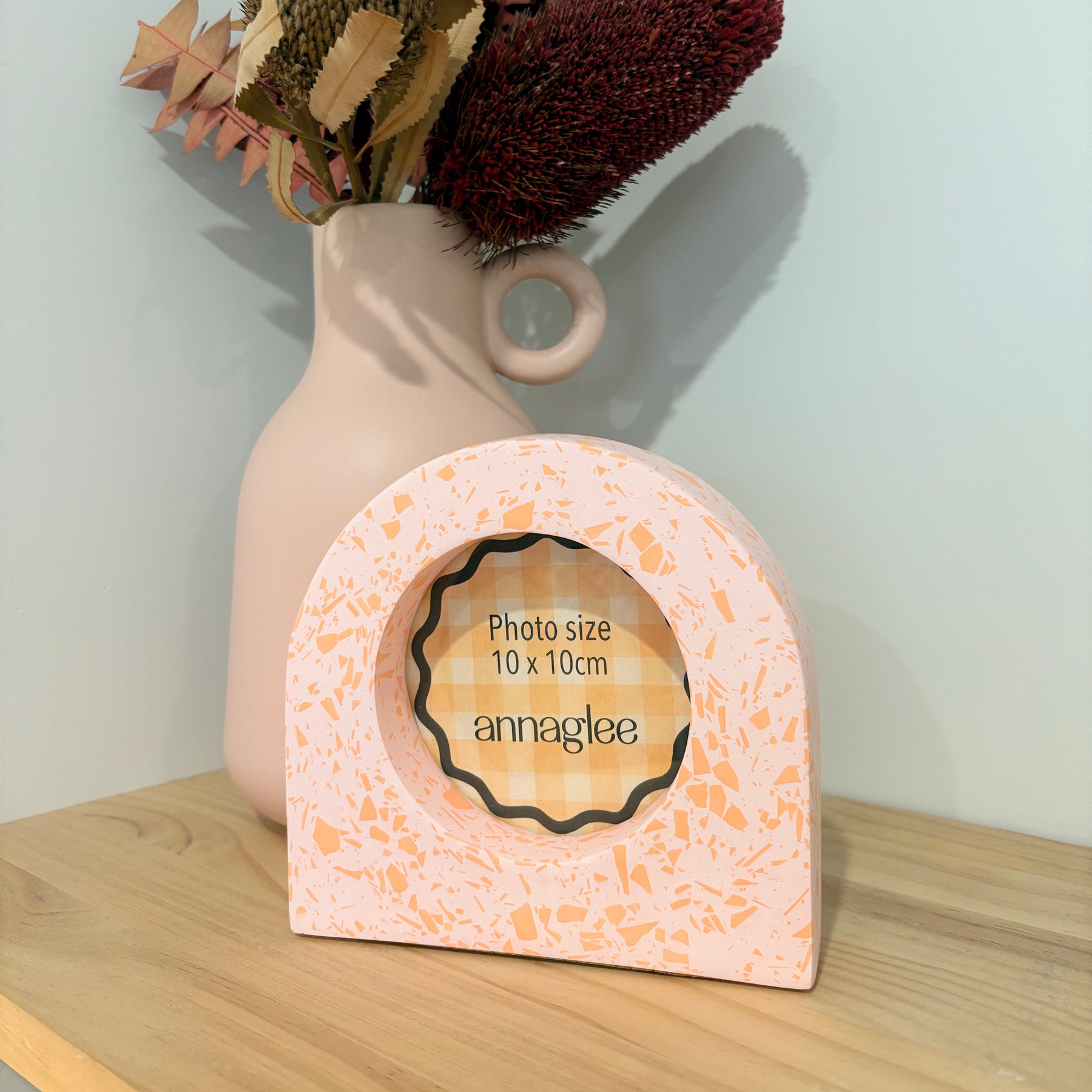 bright pink and orange acrylic resin tabletop photo frame