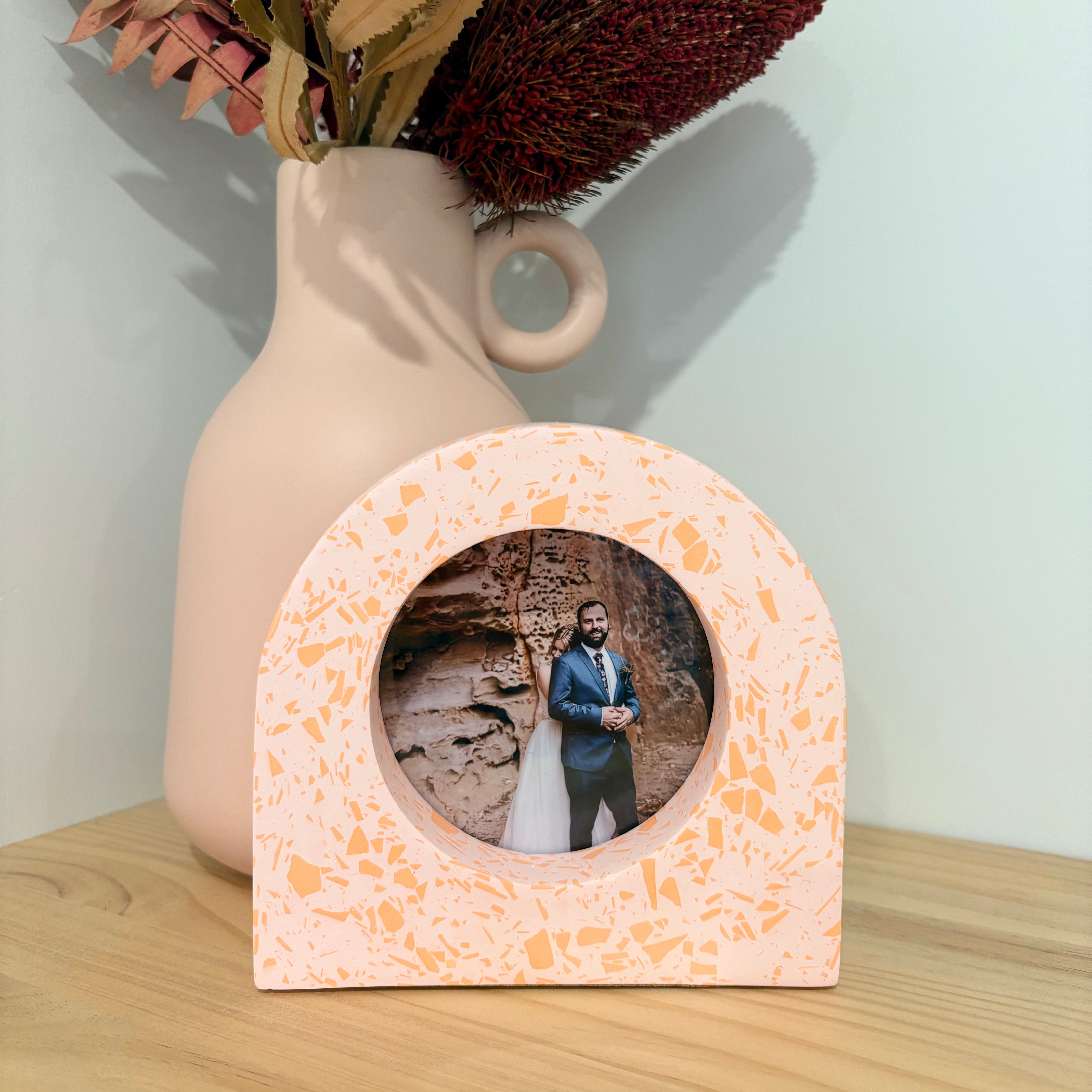 bright pink and orange acrylic resin tabletop photo frame