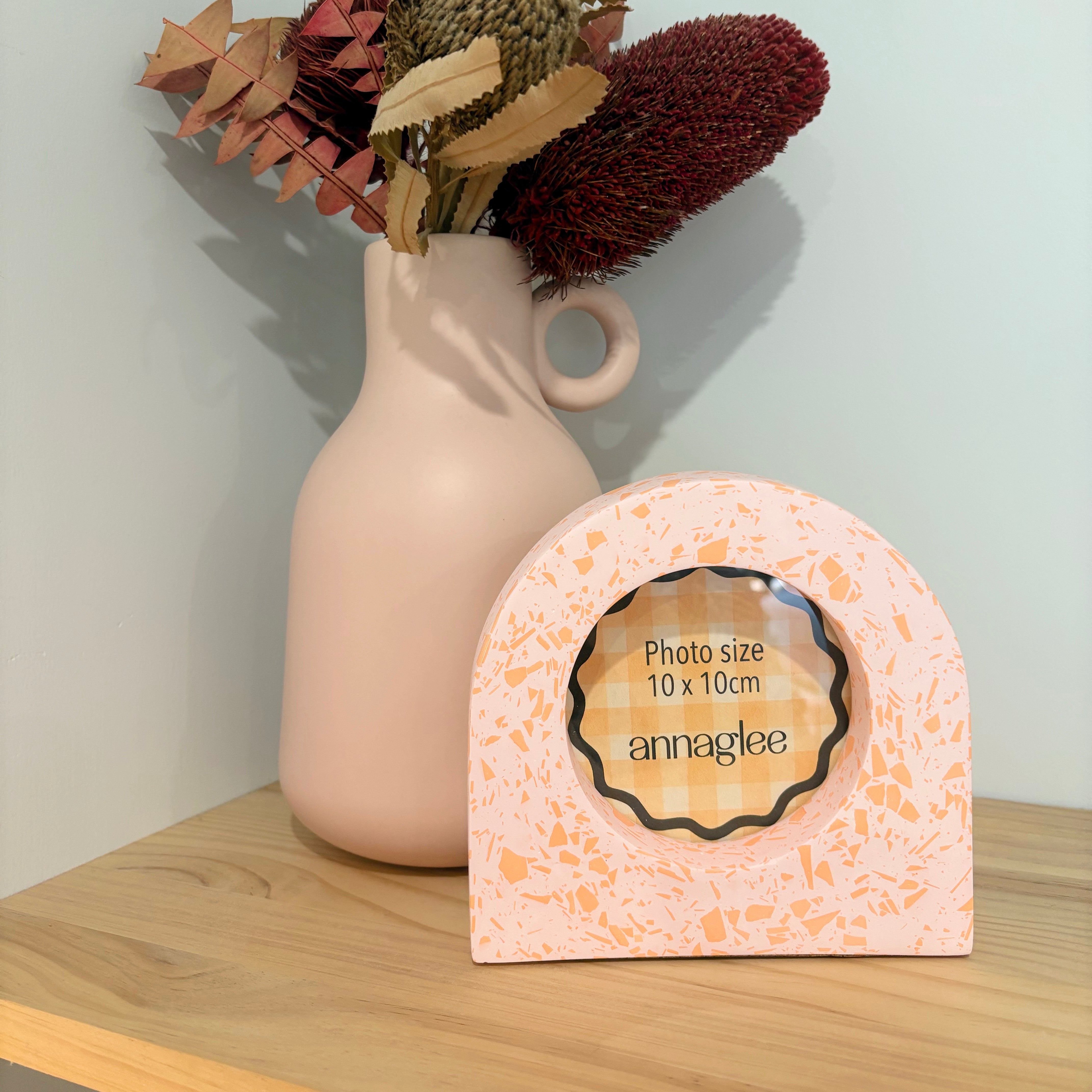 bright pink and orange acrylic resin tabletop photo frame