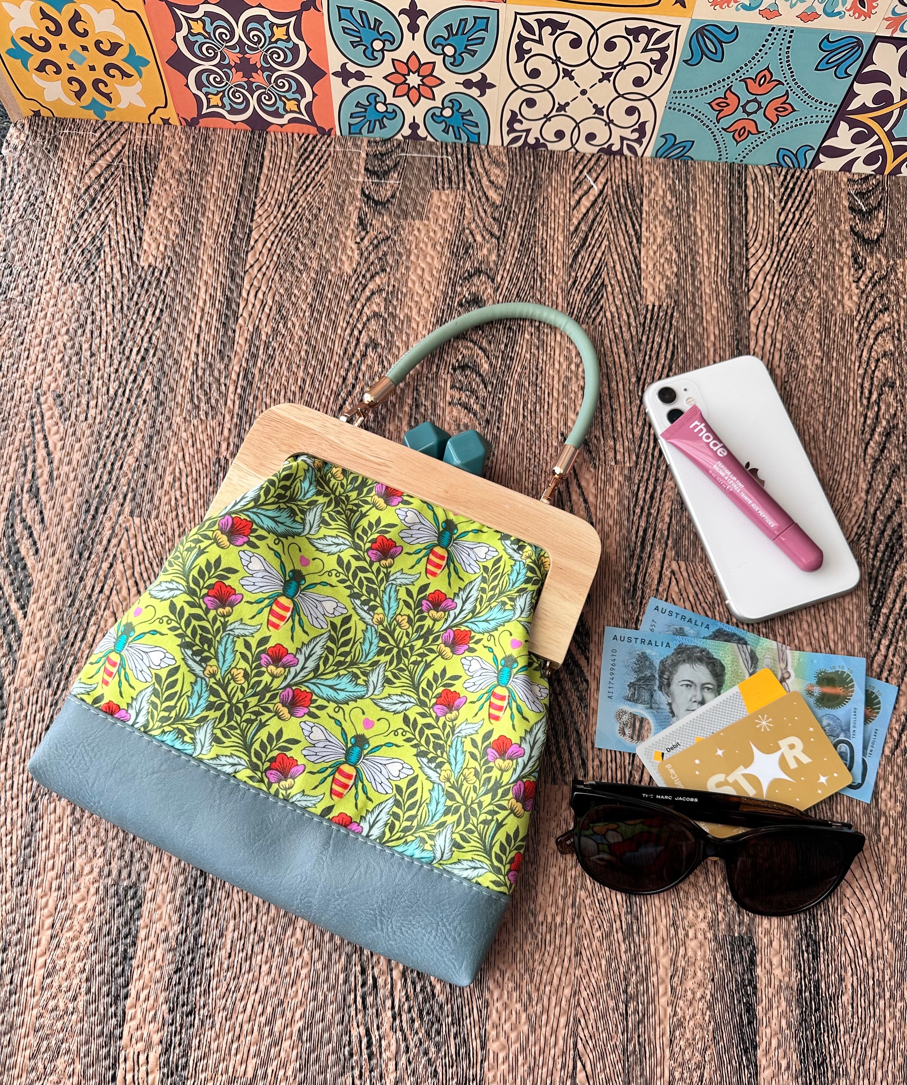 Kiss Lock Clutch with Vinyl Handle