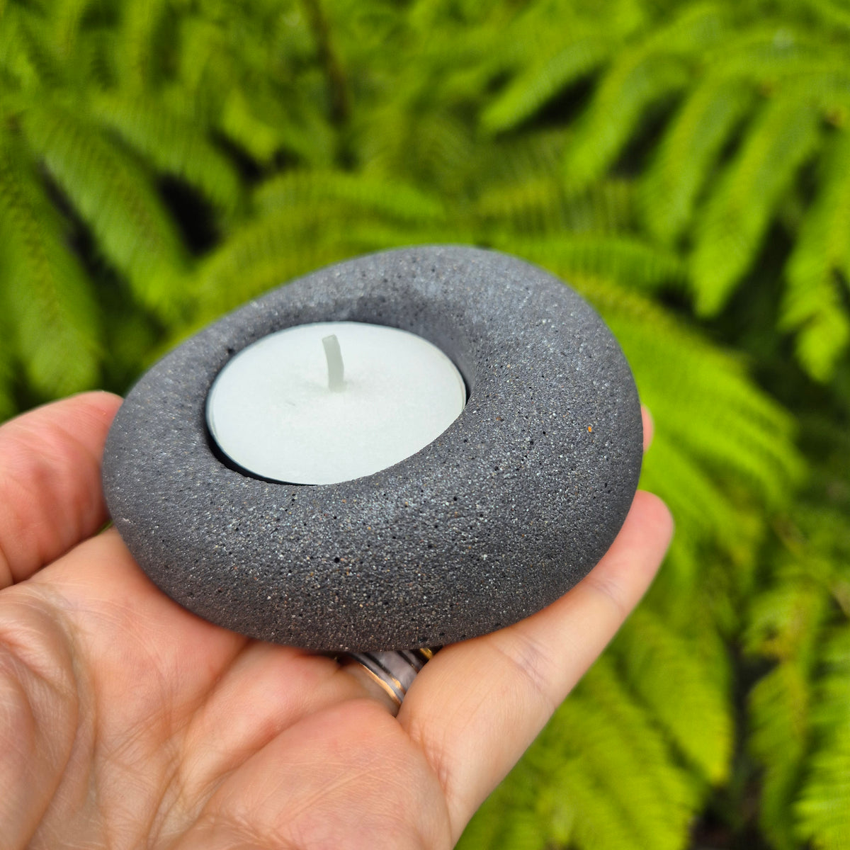 Black eco-stone pebble shaped tealight candle holder