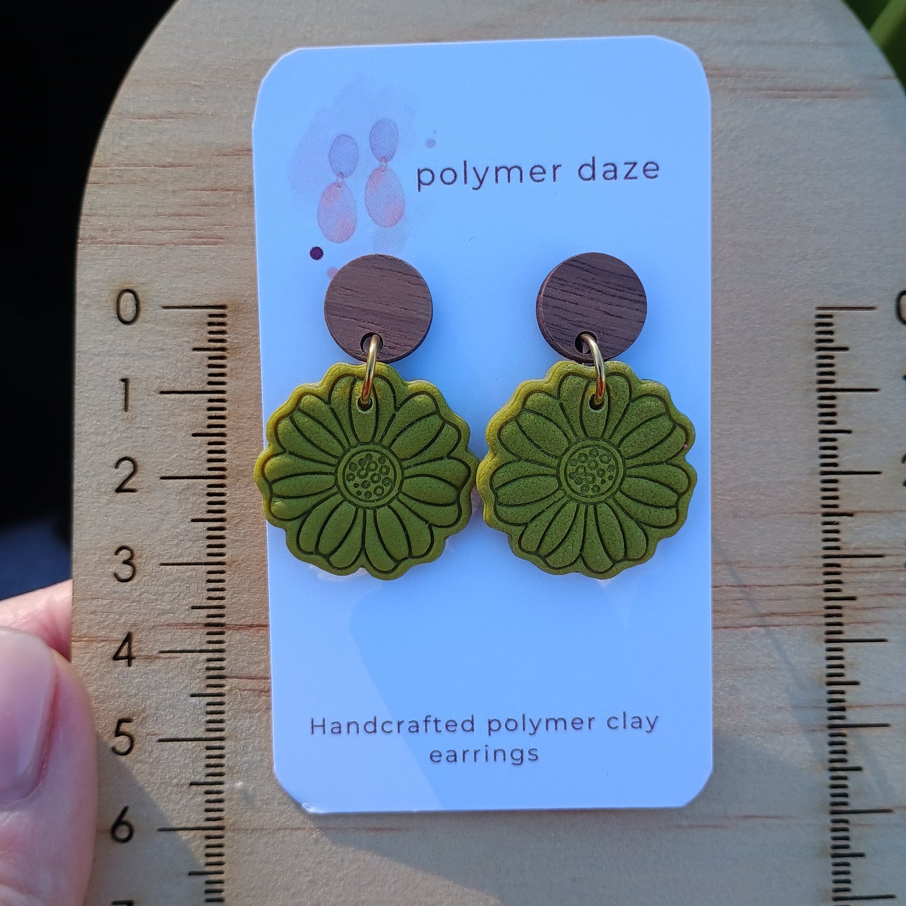 Embossed flower earrings with natural wood stud top
