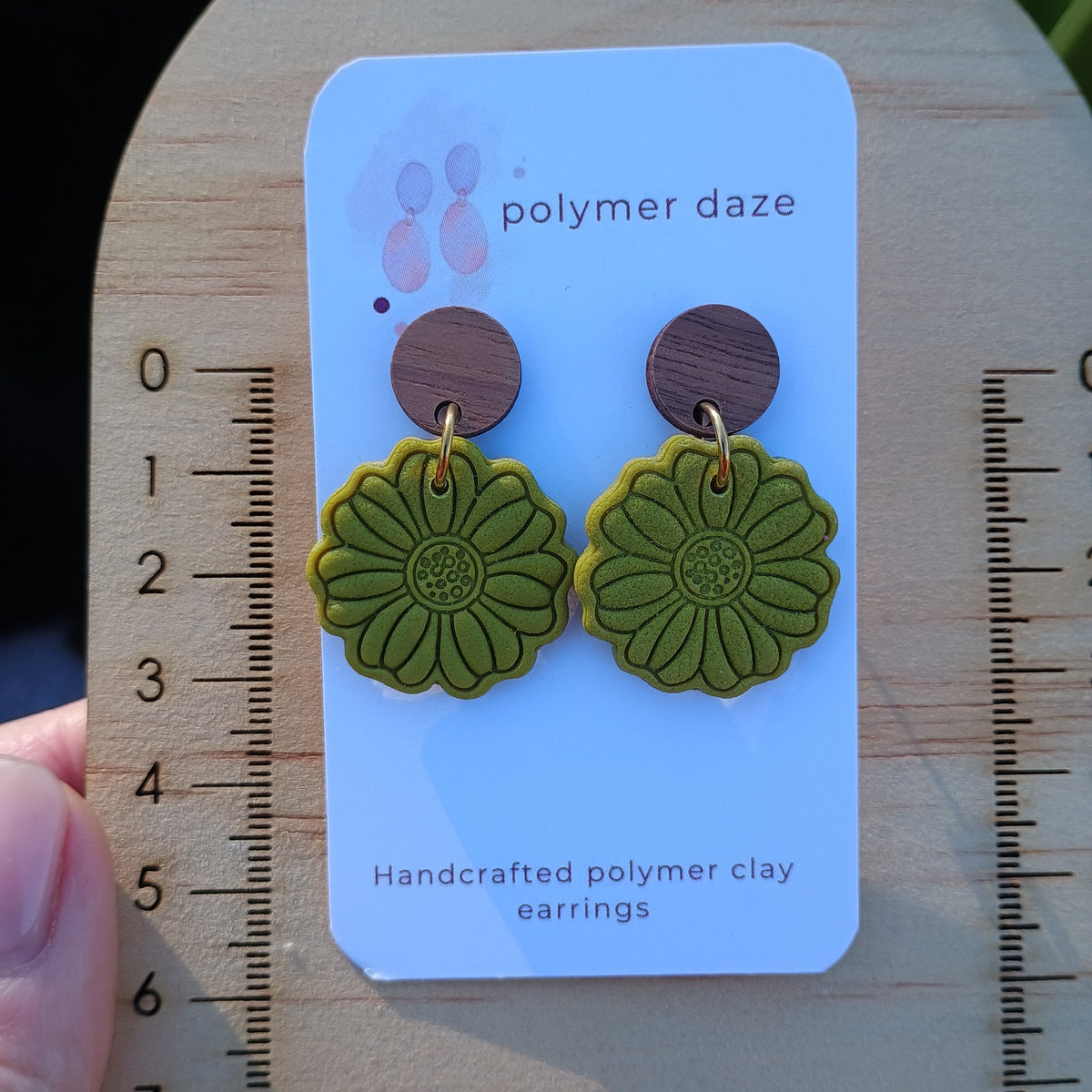 Embossed flower earrings with natural wood stud top