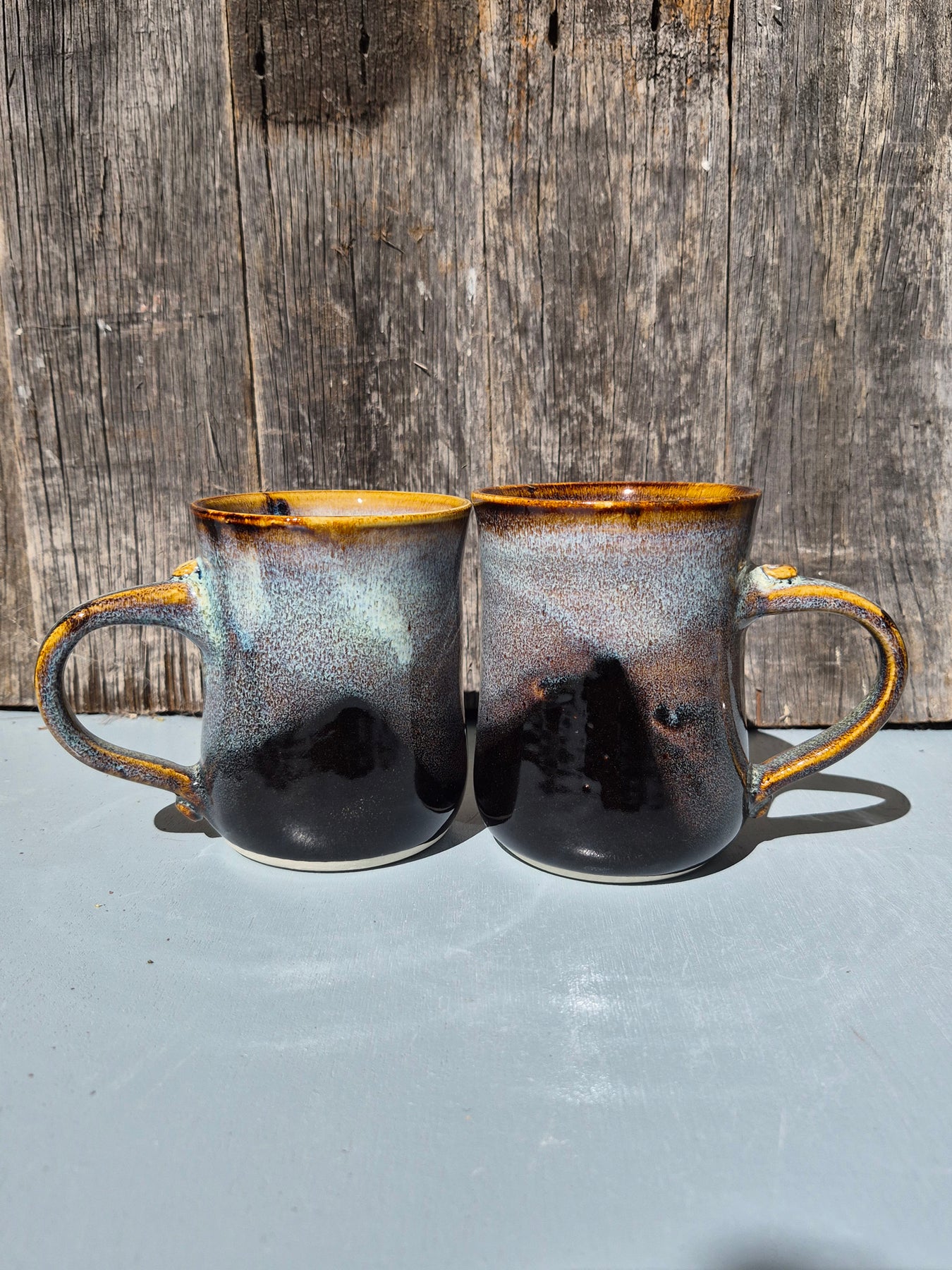 Large hand made mugs in speckled brown and white