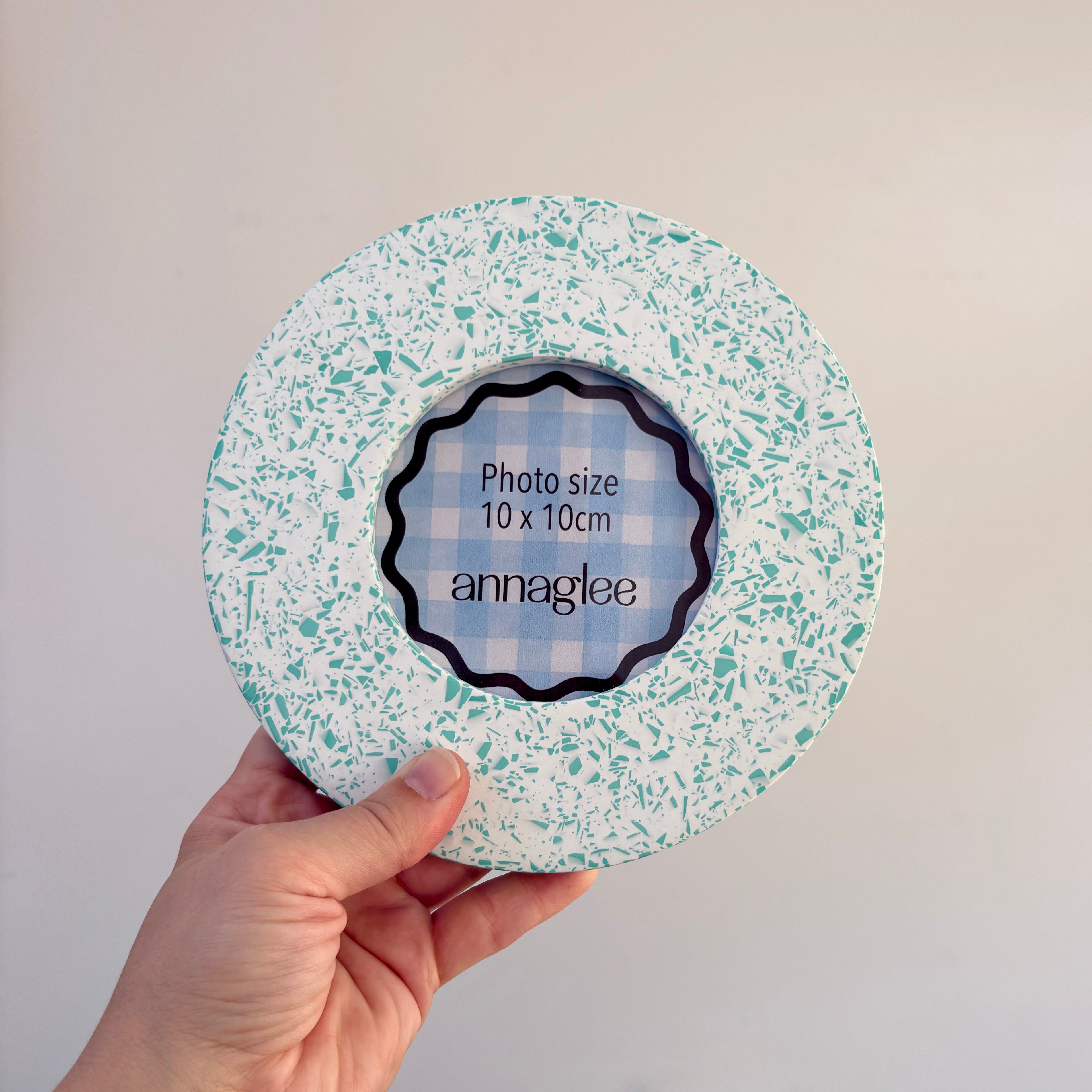 Bright teal green and white terrazzo pattern wall hanging picture frame
