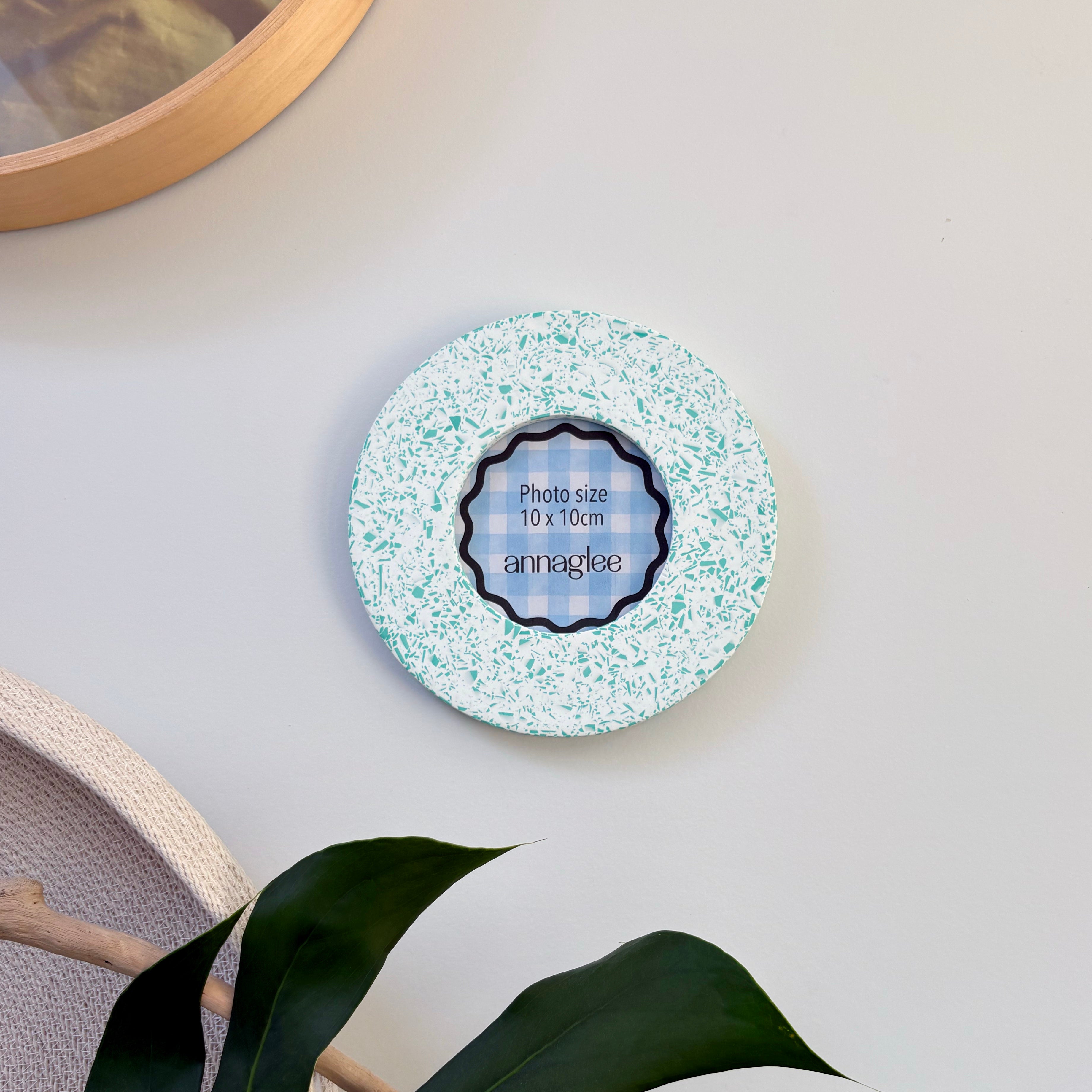 Bright teal green and white terrazzo pattern wall hanging picture frame