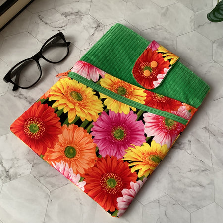 Colourful daisies book sleeve with 2 pockets. iPad, tablet pouch