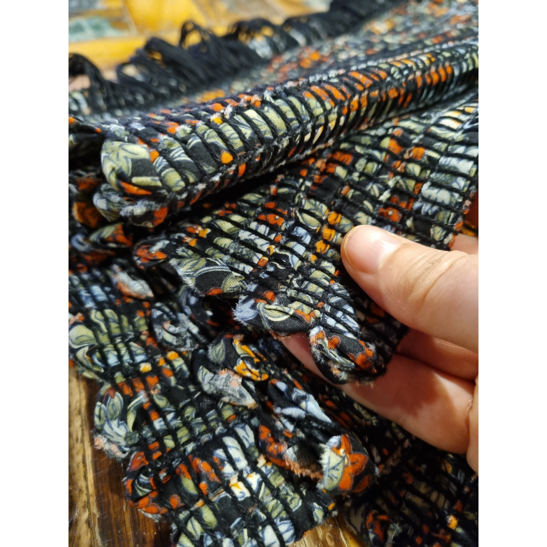 Woven black and orange floral tablerunner