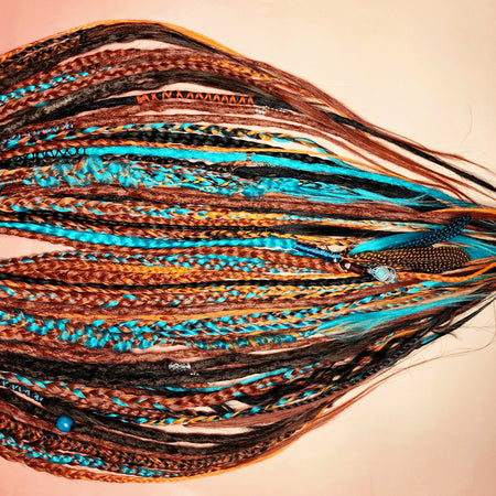 Dreadlock hair extensions. Braid in re usable temporary dreadlock extensions. CELTIC FIRE PHOENIX SET