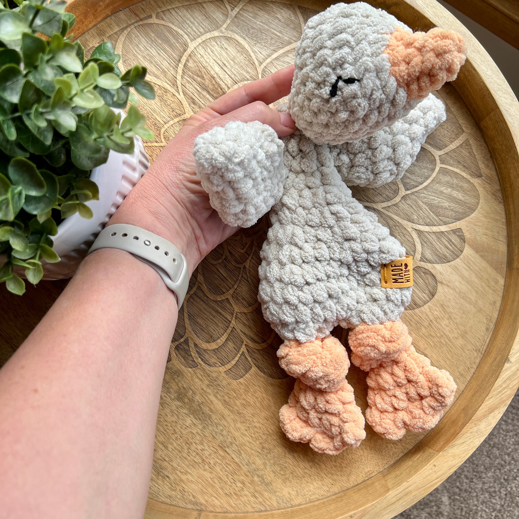 Handmade crochet Mini Goose modern lovey with knotted legs.