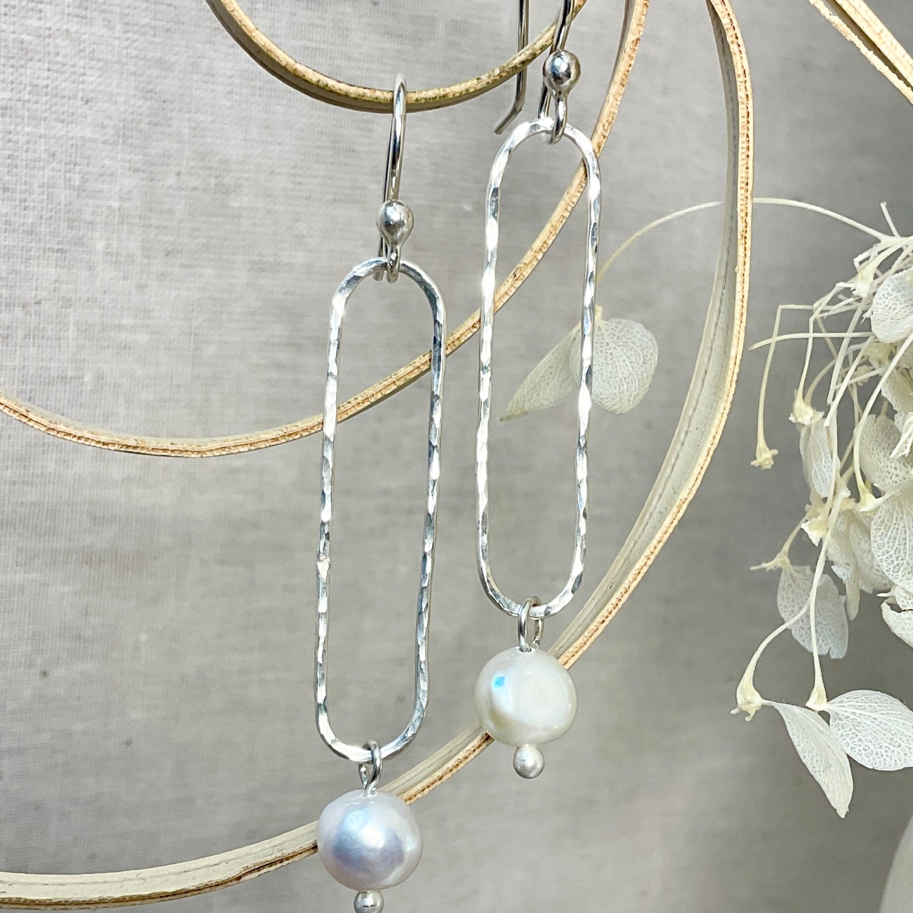 Pearl and Argentium silver earrings.