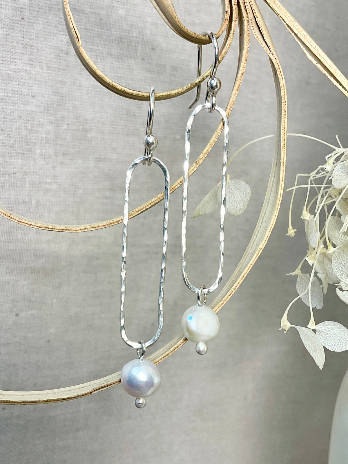 Pearl and Argentium silver earrings.